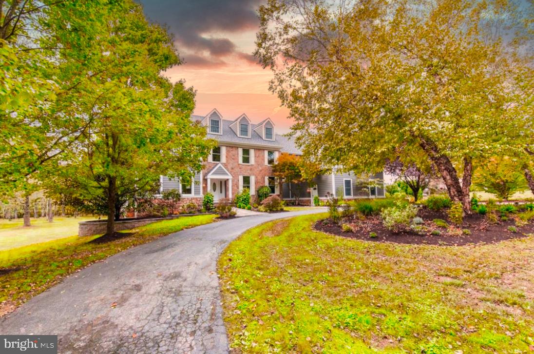 Welcome to 508 Reservoir Road, a property convenient for the 2020 lifestyle. This is a stunning home with a spacious floor plan ideal for many. This 4800+ SF, 5 bd, 4 full and 2 half bath home checks off all your boxes. This home has been updated and you will notice the care and attention upon arrival. The horseshoe driveway can park multiple cars and makes it easy for entertaining. Enter the home into the foyer and take note of the spectacular hickory hardwood floors throughout and natural sunlight that boasts through. To the right of the foyer you have a formal dining room. To the left you have a formal living room with a fireplace – next to this room is a office – ideal for virtual learning, homeschooling or working from home. This space wraps around back to the foyer – in between you will note a double coat closet and a powder room. This space flows right into the magnificent kitchen. This gourmet kitchen is equipped with luxury stainless appliances, double ovens, ample storage space, white cabinets and a gorgeous countertop. The 15 foot kitchen island has a sink and is also a table – convenient and practical. Adjacent to the kitchen is a family room with a stone fireplace, high cathedral ceilings and sliders to the rear of the home. The deck is expansive and also offers a covered area which is ideal to grill and sit on those rainy nights. Located off of the kitchen is another powder room, a mudroom, an entry to the garage and also a second set of stairs to go up to the 2nd floor.From the foyer take the beautiful staircase to the second floor and see the spacious flow of the second level. Straight ahead you have the master bedroom. You must go through a “sitting area” to get into the master bedroom. This space can also be utilized as a small home office. The master bedroom is generous in size with a large custom walk in closet and a master bathroom with dual vanity sinks. The endless amount of sunlight from every corner is inevitable. There are 4 additional bedrooms on this floor and all are generous in size, are equipped with ceiling fans and lots of natural light.. There is a jack and jill bathroom and a hall bathroom that is shared with another bedroom. The Jack and Jill bathroom consists of dual vanities. A linen closet and 2nd floor laundry room complete this level. This spacious room boasts natural light and shares a full bathroom with the room next door.. The hall bathroom consists of a tub shower, gorgeous tile floors and a double vanity. Past the kitchen you access to the oversized 3-car garage. This space also has access to the finished basement. The lower level is finished and has a great floor plan for entertaining. There are multiple (4) rooms on this level you may use as bedrooms, as an office or a great space for virtual learning. There is a bar set up in the basement which is great for entertaining. There are a set of stairs going into the garage. A full bathroom and a sliders exiting towards the back of the home complete this level. This space is a great area for virtual learning or your home office- options are endless. The basement is finished with luxury vinyl floors and is ready for it to be utilized in whatever way you choose. This home is situated on 4.2 acres –giving you lots of time outside. There is a pond and also 2 streams to explore. This home has many new updates, some updates are Smart technology, new lighting, new roof, new kitchen, new hardie board siding and much more. This home is located within West Chester School District and is conveniently located within close proximity to major roadways. This home is truly your own getaway – you can call it Home Sweet Home this Spring Season.