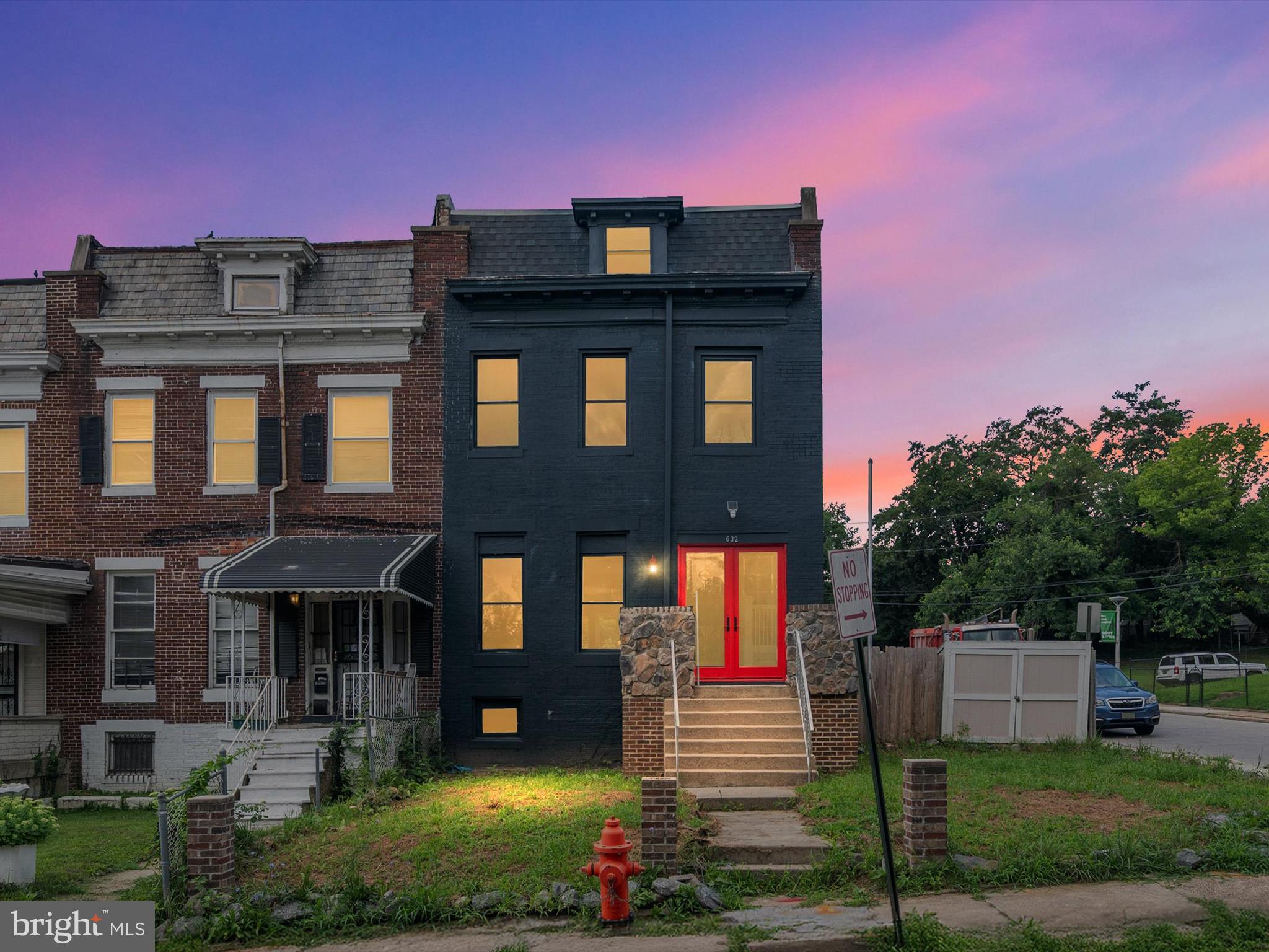 Fully Renovated end row townhouse facing mature green trees, providing a natural sound barrier to the noise and hassle of the city in this centrally located quiet neighborhood. Walk through the custom made double wide front door and prepare to be blown away.This top to bottom renovation has been meticulously crafted to the highest standards, from the coffered ceilings to the extra tall heights throughout, the thoughtfully designed open-concept layout was created without compromise— providing a true, airy flow throughout the main living space. Walk through the large modern kitchen to the double sliding doors to your outdoor space, and imagine the gatherings of family and friends you could enjoy in that extra large fenced in backyard. Upstairs, the primary suite has a brand new en suite bathroom with a tiled walk in shower. Three additional light-filled bedrooms share a modern hall bath, ideal for family or guests. The fourth level has been insulated and carpeted to give you extra space for your children to use as a playroom, or you could easily set up your home office, without worrying about heating or cooling. The lower level is finished and ready to be used as a large family room with beautiful laminated flooring and a full bathroom, providing a huge space for family and friends to enjoy movies, and or game nights in. Washer and dryer hookups are already installed. Tons of on street parking but if you would like to add parking in the backyard, there is potential for two car parking pads through the alley. This home has been extensively updated with all new drywall, new insulation throughout, a high-performance HVAC/gas furnace, new high-efficiency windows and doors, and a new water heater. Built with quality materials and modern efficiency in mind, this home is completely move-in ready. Step onto the cheerful front porch, enjoy your morning coffee, and picture yourself in this perfect blend of comfort, character, and modern living at its best.