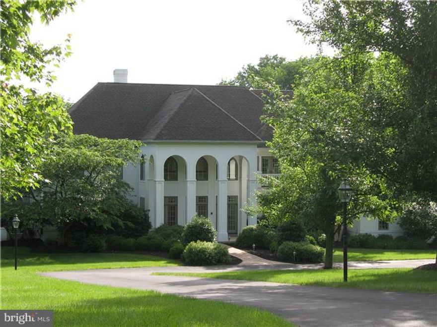 This Magnificent  custom home is situated on a private drive in prestigious Solebury Township,  nestled among a select enclave of highly desirable and beautiful custom  homes built by  well respected  custom builder, Richard Zaveta. This 5 Br, 4   BA and 3 FP majestic home sits on 3.85 acres of natural  beauty and  privacy. Enter the grand foyer and admire the magnificent 2 story living room with wall of windows that leads you to an exquisite terrace overlooking a beautiful swimming pool with lush, specimen plantings and landscaping. Admire the extraordinary craftsmanship and attention to detail  that resonates throughout this gracious residence.  Be impressed with the spaciousness of the designer kitchen with morning room and butler's pantry. Featuring all custom interior finishing, this home is cloaked in handsome cherry wood, bathed in natural sunlight from tall and oversized windows and adorned by intricately designed ceilings, custom millwork and built-in cabinetry. The luxurious master bath was just renovated (2014)  and additional enhancements have recently been completed.  The finished lower level with ground floor elevation was designed with entertaining in mind with indoor and outdoor entertainment areas and atrium doors that lead to a covered patio and luxurious in ground swimming pool. A recreational room, exercise room, 5th bedroom and full bath complete the lower level.