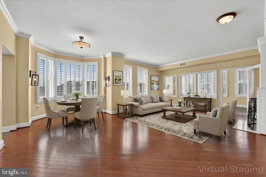 ••The Stratford House! Luxury Living at it's Best! Gorgeous & Contemporary with Open & Flowing Floor Plan. Spectacular sunset mountain views AND views of Reston Town Center’s Market Street.  One block from Reston Town Center and 3 blocks from the Metro Station, Reston.   


 ••Enjoy the spectacular view of treetops, swimming pool, and Reston Town Center. One block from Reston Town Center and 3 blocks from the Metro Station, Reston. Nearly 1700  square feet and Hardwood floors run throughout!  Two Bedrooms and 2 Full Baths, Living Room with a Gas Fireplace, Dining Room, DEN, and Kitchen with Breakfast Area.  Hardwood floors and Plantation blinds throughout!

The Primary Bedroom includes DEN access, large walk-in closets and an en-suite bath with double vanities, separate shower, and Jacuzzi tub.  The second bedroom offers more beautiful views, oversized closet with built shelves and storage. Full size washer & dryer

Check out the #D Matterport tour!

••TWO Nice Underground Garage Parking Spaces , Double Wide Storage Locker and plenty of outdoor parking for guests. The well maintained building features an ELEVATOR from the basement garage. Enjoy your summer days at the community POOL or workout in the FITNESS CENTER or enjoy nature on the W&OD trail that is right next to the complex. Then treat yourself to dinner at one of the many wonderful restaurants that the Reston Town Center has to offer! Close to everything including public library, grocery stores and pharmacies. Need to Commute? No worries! The Toll Rd. is up the street or take the METRO to work or just to visit DC - the new station is adjacent to the Town Center.  

••Check out the 3D Matterport & Professional Photos