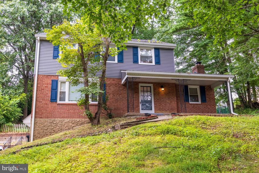 NEW PRICE!!!  Don’t Miss This Rare Opportunity! Charming and well-maintained 3-bedroom, 2.5-bath Colonial  nestled high off the road for added privacy and curb appeal. Brand NEW HVAC system. This home offers warmth, character, and plenty of space both inside and out.  Step inside to find beautiful hardwood floors throughout, a cozy family room with a wood-burning fireplace, and a welcoming living room featuring rustic wood beams. The sunlit dining room and spacious eat-in kitchen flow perfectly into the outdoor patio; ideal for relaxing or entertaining. Upstairs, the generous Master Suite offers hardwood floors, ample closet space, and a full bathroom.  Two additional bedrooms and a full hall bath complete the upper level. The finished walk-out basement is currently being used as a 4th bedroom, but it’s flexible enough to serve as a recreation room, home office, or additional living space.  The attic offers ample space, perfect for storing seasonal items, decorations, and more.  Enjoy wooded privacy on the back patio, with plenty of room for gatherings or quiet evenings outdoors. A long driveway fits 5–6 cars with ease, and there’s convenient access to the home directly through the walk-out basement.  Located minutes away from Springfield Shopping Center, & local parks.  Easy access to major routes and only 15 minutes to the airport. this home offers unbeatable convenience and value.