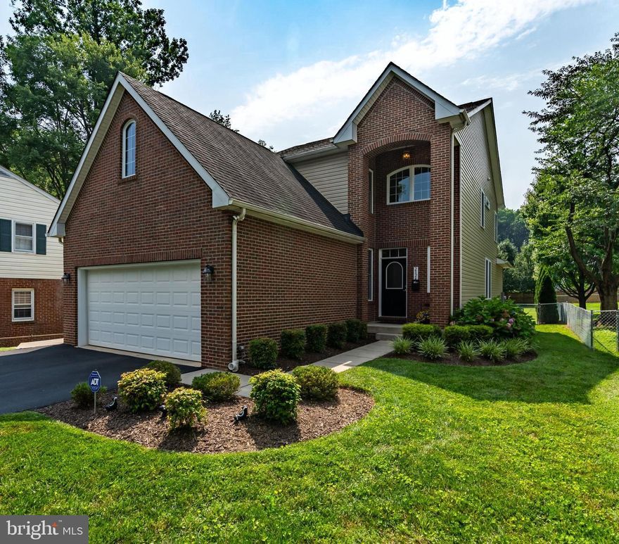 Beautiful 4 BR/4 BA Brick Craftsman with over 3,600 sq ft of living space, built in 2015 in Sought after Greenway Downs, named one of Arlington Magazine's 10 Best neighborhoods to live!! 
This Home features amazing natural sunlight throughout, accenting the lovely finishes. *** Main Level features two-story Entry Foyer w/ Crown Molding, Hardwood Floors, and Recessed Lighting throughout. Eat-in Gourmet Kitchen has tons of counter space w/ Granite counter-tops, plus built in Grill, Griddle & Range Hood.  Large Island, Eat-in Breakfast area opening to Family room, and Separate Formal Dining room w/ French Doors (can double as Office or additional Bedroom). Main Level Primary Bedroom Suite w/ Ceiling Fan, Dual Vanity Bathroom and Large walk-in Closet.  Mud Room & Laundry separate Kitchen from Two car garage, plus,  rear Deck & private Stone Patio w/ built-in grill area & firepit (perfect for entertaining), overlooking the large fenced level back yard. 
*** Upper Level features a second Family Room/Sitting Room, spacious En-Suite (perfect for AuPair) w/ Private Bathroom, Walk-in closet, plus Bonus Room (great for home-office, playroom, workout room or extra storage), plus Two other Bedrooms share a 4th bathroom. 
***Spacious Lower Level w/ tons of natural light features high 9' ceilings w/ walk-out walk-up stairs to sideyard. Fully insulated w/ rough-in for additional bathroom, plus full size windows (ready for the new owners to design their perfect recreation/party room & additional guest room).  
Plus Spacious Two Car Garage, plus additional off-street parking - Only a short distance to John Mastenbrook Greenway Downs Park. Great location close to Downtown Falls Church City shops & restaurants, and less than 3 Miles to Mosaic district. Nestled between Routes 29 & 50 w/ easy access to I-66 & I-495, and only a short commute to Pentagon & Washington DC.