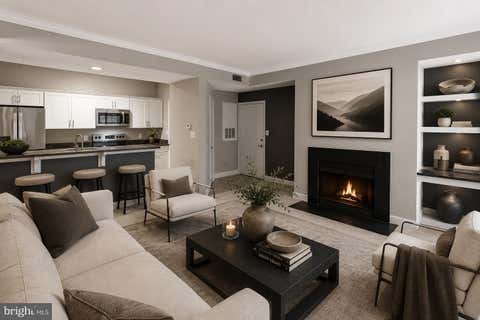 Photo of 12155 Penderview Terrace #823, FAIRFAX, VA 22033 (MLS # VAFX2311564)
