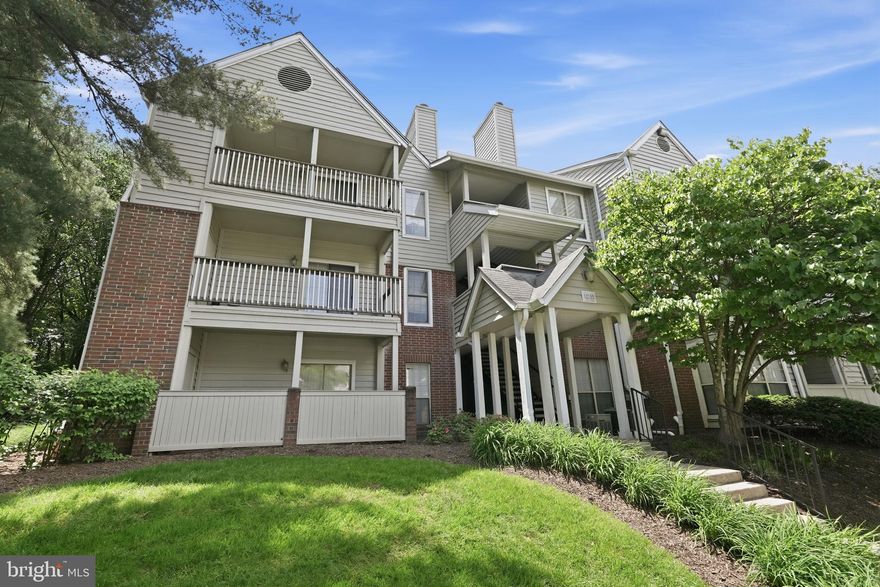 Nestled within the sought-after Penderbrook Square Condominium community, 12155 Penderview Terrace #823 offers a beautifully maintained second floor layout designed for both comfort and convenience. This inviting residence features approximately 876 square feet of thoughtfully designed living space, including an open-concept living and dining area, an updated kitchen, two bedrooms, one full bath, and a private outdoor patio. The spacious main living area is accented by a cozy wood-burning fireplace, custom built-in shelving with desk space, and abundant natural light that creates a warm and welcoming atmosphere.

The kitchen has been tastefully updated with white cabinetry, granite countertops, stainless steel appliances, breakfast bar seating, and an oversized walk-in pantry that provides exceptional storage. The primary bedroom features a tray ceiling, ceiling fan, and an expansive walk-in closet, while the second bedroom offers direct access to the private patio and attached storage closet—an ideal setting for morning coffee or relaxing at the end of the day. The well-designed bathroom includes dual access, extensive vanity storage, oversized mirrors, and the convenience of an in-unit washer and dryer.

The property also includes one assigned parking space along with ample guest parking.

Residents enjoy access to an impressive collection of amenities to include pools, fitness centers, clubhouse spaces, playgrounds, grilling areas, basketball, pickleball, and tennis courts, scenic walking trails, and discounted golf privileges at the Penderbrook Golf Course. Ideally located near shopping, dining, commuter routes, and public transportation, this home offers the perfect blend of low-maintenance living and active community lifestyle.
