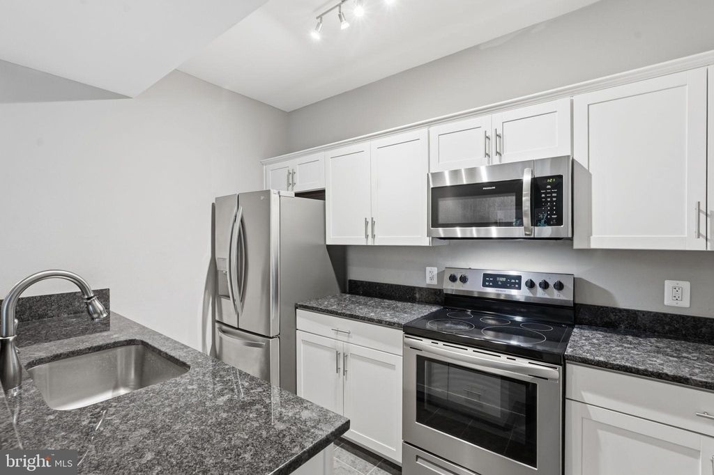Photo of 12155 Penderview Terrace #823, FAIRFAX, VA 22033 (MLS # VAFX2311564)