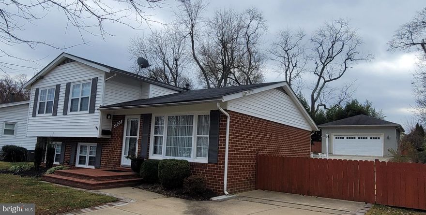 Totally Upgraded Split Level Single Family Home with Big Finished 2-Car Garage, 4 BRs, 2.5 Baths located in Kenwood neighborhood - Annandale. Spacious, Lighted and Cozy with tons of outdoor areas!!  Real hardwood flooring in Main and Upper Level and New flooring in Lower Level. Kitchen features Double Deep sink, Stainless Steel Appliances with tons of counter space and Recessed Lighting. Entire home has been Freshly Painted (2023). Crown molding in every bedroom with recessed lighting and newer 6- panel doors all with matching hardware. Tastefully upgraded bathrooms with elegant touches.  Fourth Bedroom leads to a Private and Luxury bath. Other important updates includes newer HVAC ( 2021), Tankless water heater (2021)  Extensive 24x24 finished 2-car garage with mini- AC (2020) can be used for Rec./Party room. Lighted and Roomy deck is ideal for cookout. Enormous and well maintained backyard with mature trees.  Long driveway for 6 six Parking Spaces.  There is a Basket Ball play court.  Beautiful brick steps in Front Door.  Sellers prefer Regency Title at closing.