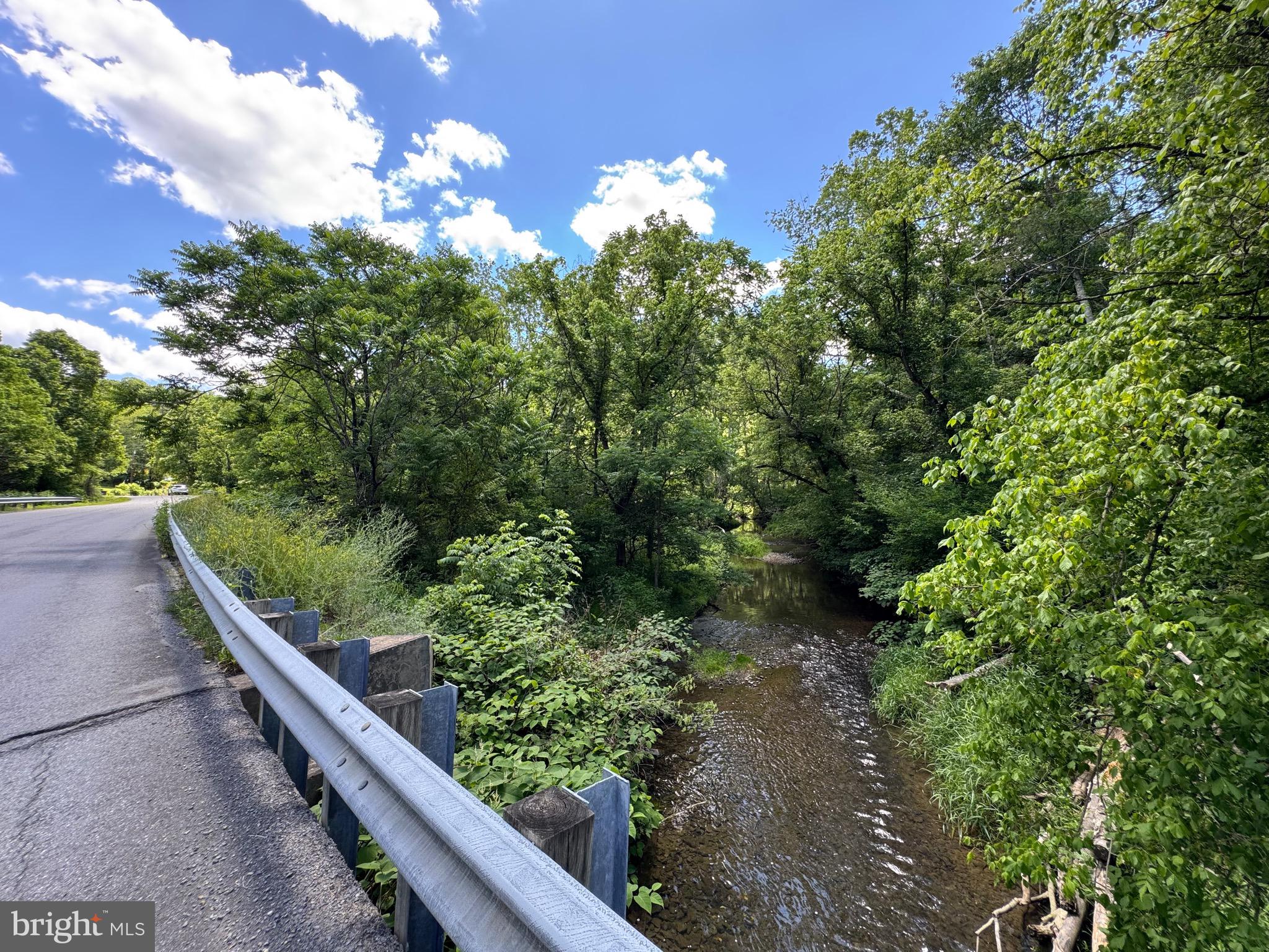 SAND MINE ROAD BY CREEK