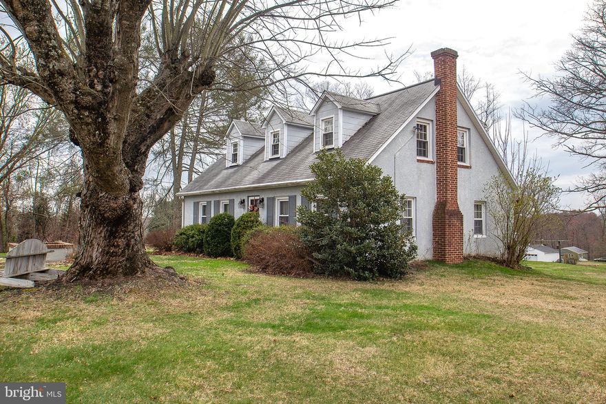 Charming Cape Cod-style home nestled in desirable Sparks and located within the highly sought-after Hereford School District! This well-built 1946 home showcases the enduring quality of a bygone era, paired with some thoughtful modern updates.  Featuring 4 bedrooms and 1 full bath, the flexible layout includes a main-level bedroom and three additional bedrooms upstairs, with the fourth bedroom accessed as a pass-through—ideal for a nursery, office, or sitting room. The kitchen and bath have been updated in recent years, while beautiful wood flooring runs throughout the home. Enjoy the warmth of a free-standing propane stove in the dining room and a spacious country kitchen with ample table space—perfect for gatherings. Replacement windows throughout enhance efficiency and comfort. Step outside to relax or entertain on the rear deck or covered porch overlooking nearly one acre of land across two separate parcels totaling .993 acres—plenty of room for outdoor activities, gardening, or expansion possibilities. 
Additional highlights include a detached 900 SF garage offering abundant enclosed parking, storage, and workshop space, plus a separate garden shed (formerly used as a smokehouse), adding charm and utility. The unfinished basement provides over 1,000 SF of additional space for storage or future finishing. 
No HOA. A rare opportunity to enjoy space, flexibility, and timeless construction in a prime location!