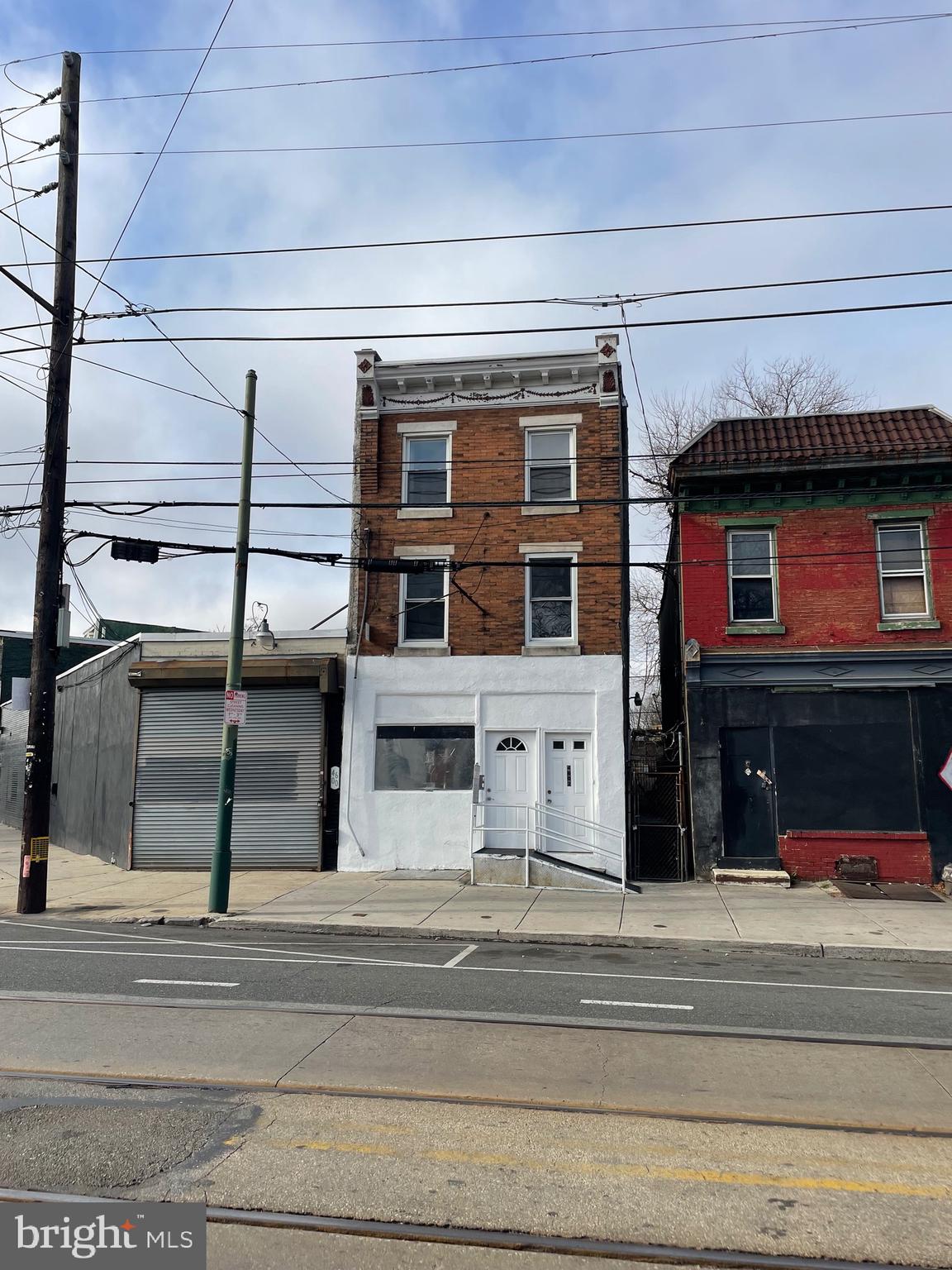 Excellent Investment Opportunity on Lancaster Ave!
Spacious mixed-use property in a rapidly developing corridor. The **first floor** includes a former office space with a full bath, powder room, kitchen, one bedroom, storage room, and access to a small backyard. The **second floor** offers 2 living rooms, a kitchen, 1 bedroom, and a full bath. The **third floor** features 2 large rooms with great potential. High-ceiling basement, 2 heaters, and **separate meters**. Ideal for investors or live/work use. Property is being **sold as-is**. Prime location with high visibility and strong upside—don’t miss out!