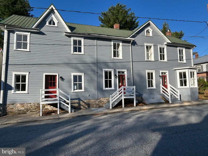 Circa 1890 historic residence in the heart of Burkittsville masterfully reimagined with high-end finishes and modern infrastructure. This distinguished property, believed to have once operated as a tavern, has undergone a comprehensive renovation with permitted improvements inspected by Frederick County Government.  

The thoughtfully redesigned floor plan offers 4 bedrooms and 3 full baths, with a 1st floor master suite and en-suite bath.  A blend of historic character with contemporary comfort. A designer kitchen anchors the home, featuring granite countertops, stainless steel appliances, and generous gathering space ideal for entertaining. Dual-zone HVAC ensures year-round efficiency and comfort.

Recognized by the Maryland Historical Trust, the exterior has been meticulously restored using historically appropriate materials to preserve architectural integrity while enhancing curb appeal.

Set on a beautifully landscaped lot with covered porches and a screened porch for refined outdoor living.  Brand new 2 car rear parking pad.  Scenic views and convenient commuter access complete this exceptional offering.  This home shows great and offers tremendous value considering mostly all new mechanicals and interior finishes.  Schedule your visit today and be a part of this lovely homes new chapter.