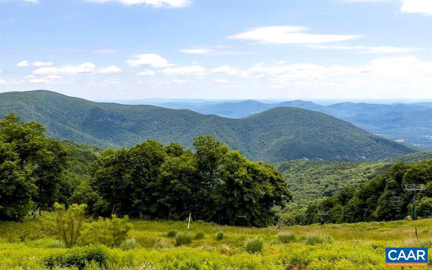 Beautiful 1BR/1BA end-unit condo in the sought-after Highlands neighborhood. Enjoy a bright, open one-level floor plan with extra windows and natural light throughout. A unique Romeo & Juliet balcony opens from the dining area, and the spacious deck offers stunning views of the Blue Ridge Mountains, ski slopes, and unforgettable sunrises. Located directly across from the Wintergarden Spa & Aquatics Center and just a short walk to the Fire & Frost Bakehouse, Devils Knob Sports Center, and Devils Grill fine dining. Nestled along the Highlands leisure trail?perfect for scenic hikes. Offered turn-key and fully furnished for immediate enjoyment.,Formica Counter,Oak Cabinets,Fireplace in Living Room