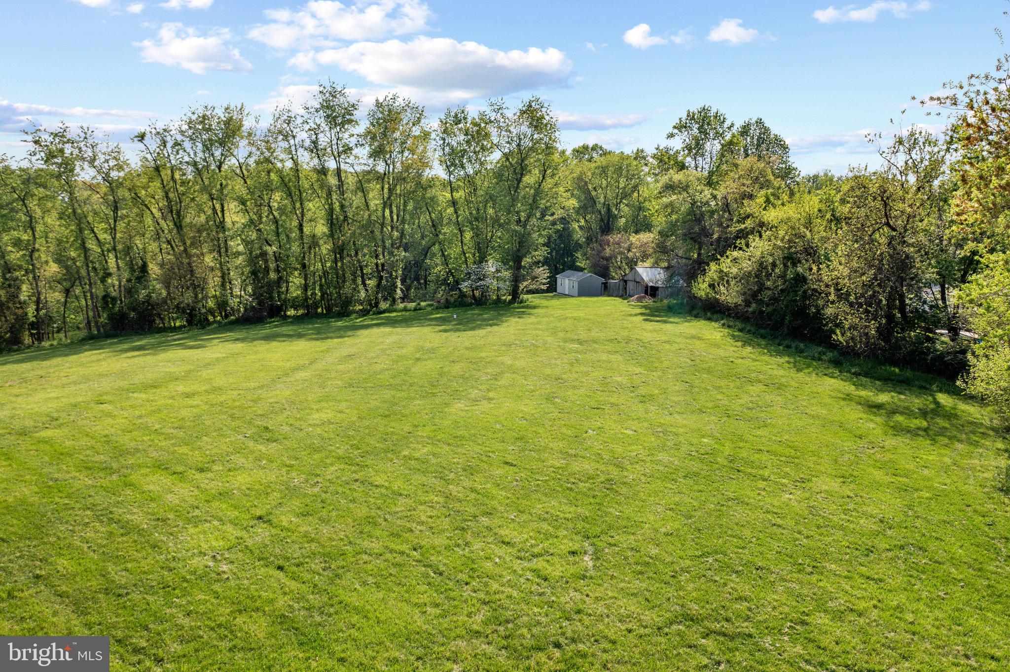 Build your dream home today on this 5.52-acre homesite in the heart of Fallston. This remarkable piece of land is now available for those seeking a tranquil setting to create their own one-of-a-kind sanctuary. No HOA. With nearly six acres of land, you’ll have plenty of space to bring your architectural dreams to life. The bottom of the property is protected wetlands with your own stream. The well is in place, at 300 feet deep yielding 5 gallons per minute and the property has already been perc tested by Harford County. This Fallston location offers a harmonious blend of rural charm and accessibility. Enjoy the peace and quiet of country living, while benefiting from an area that provides easy access to major transportation routes, shopping, dining, and recreation. Please reach out to discuss the redline structural house plans the seller previously completed of an almost 4,000 finished sqft home if interested. Call me today to schedule a time to check out this beautiful property.