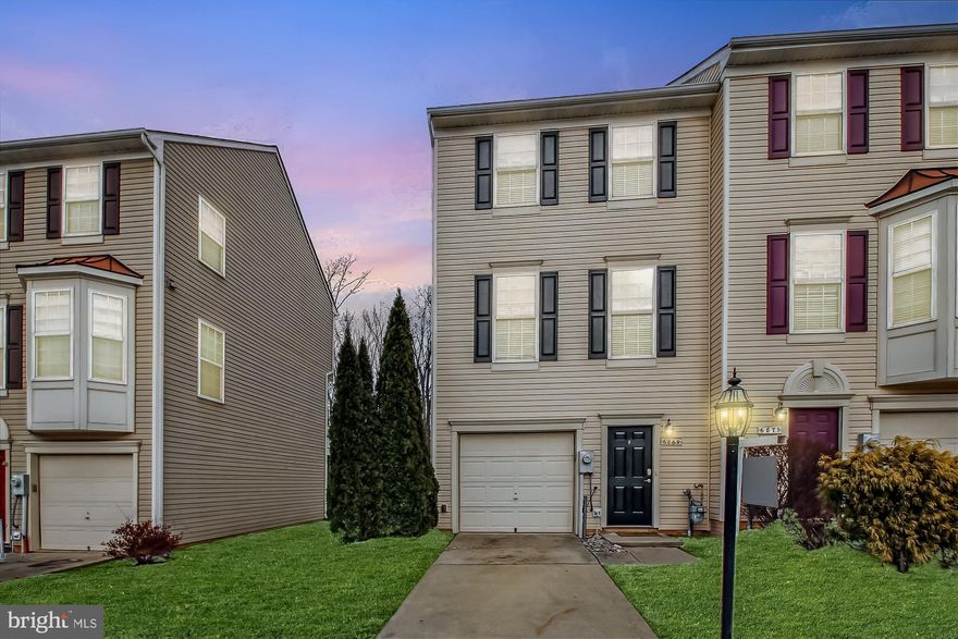 Welcome to 6869 Archibald Dr a charming 2 Bedroom 2.5 bathroom end-unit townhouse located in the highly desirable amenity rich community of Tanyard Springs! This spacious home has been renovated with all new flooring, updated appliances along with custom painting.  The open-concept design connects the kitchen seamlessly to the living room, and dining room creating an ideal space for entertaining. There is a sliding glass door from the dining room to the large deck off the kitchen with a peaceful woodland backdrop. On the upper level, you'll find two generously sized bedrooms each with their own full bathrooms. The primary bedroom features a walk-in closet and an ensuite bathroom, double vanity offering great privacy and comfort. The lower level includes a bonus den, front load washer and drier, half bath, and opens to a fenced-in backyard with a private patio. With a garage and driveway, this home has it all. The community offers an array of amenities featuring  an outdoor pool w/ toddler pool, two tennis courts, one half basketball court, 3 dog parks, 47 pet stations, 4 playground areas playfields, 2 pavilions, and a community clubhouse. Featuring 110 acres of common area and a 24 hour fitness center too. Super convenient to Fort Meade, Washington DC & to include an easy commute to NSA, Fort Meade, Baltimore, and Annapolis, with quick access to major routes like 695, 97, 95, 100, and 10.   Available immediate and come enjoy the lifestyle and comfort at Tanyard Springs.