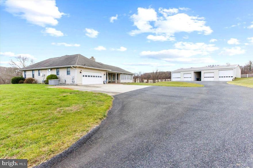 COME TO PYLESVILLE AND ENJOY COUNTRY LIFE!
A unique opportunity to own a sprawling rancher in the country, on 5 acres in Pylesville, with both attached and detached garages -room enough to store up many vehicles or toys!
Boasting with 3 large bedrooms & 2 full baths, and a double-sided stone fireplace in the center of it all, you will appreciate this wonderfully maintained home. The kitchen and main living room are in the center for the "open concept" that everyone desires. Do not miss the immense, light filled "sunroom" off the main living room, surrounded by windows and views of the vista.  
Move right in or put your creative touches to work. 
The unfinished "walkout" basement is ENORMOUS, with a powder room (1/2 bath) in use.
Bring your cars or trade to the detached garage... 
In addition to the 2 car attached garage, there is a separate structure/shop 70'x40' with a center aisle, measuring 30'x40' on each side with the capacity to hold many more vehicles.
Detached garage is heated and cooled, too!
The owners did not believe in leasing  anything so everything is owned, including the propane tank and solar panels. Ask your agent for the details including the upgrades for all of the important things!
SCHEDULE YOUR SHOWING TO SEE IN PERSON!
REASONABLE OFFERS WILL BE CONSIDERED