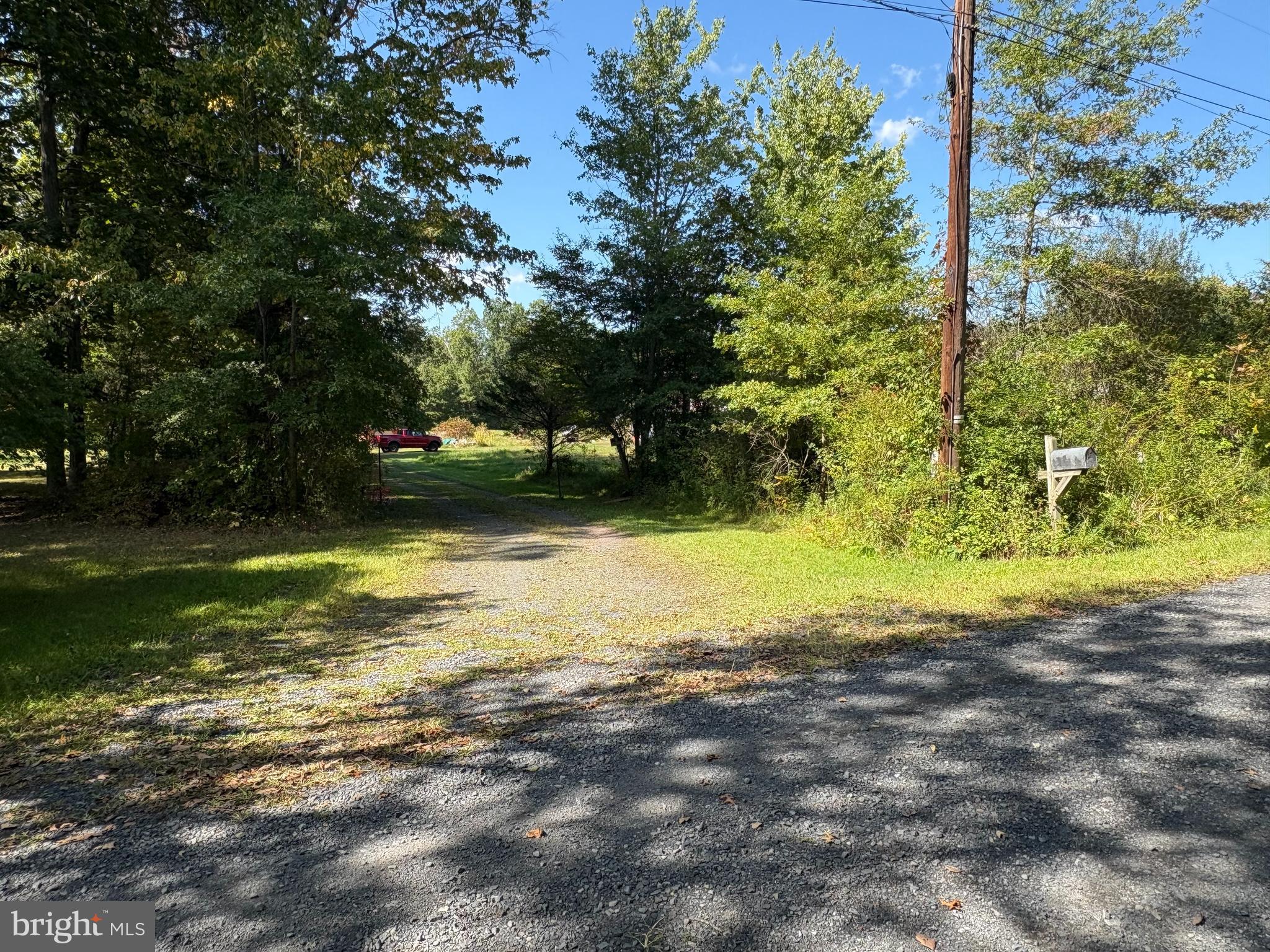 Welcome to a little piece of private heaven in Haycock Township. This property was once a beautiful family homesite which was lost to a devastating fire leaving only two outbuildings on this 10 acre private retreat. The almost 2000 square foot home was serviced by an on-site well and septic system which are still in place along with an electrical service line. The options are endless on these 10 acres from possibly rebuilding on the previous home site to finding a spot and making it your own. You may be able to sub-divide the property if the powers that be allow it. Just use your imagination.