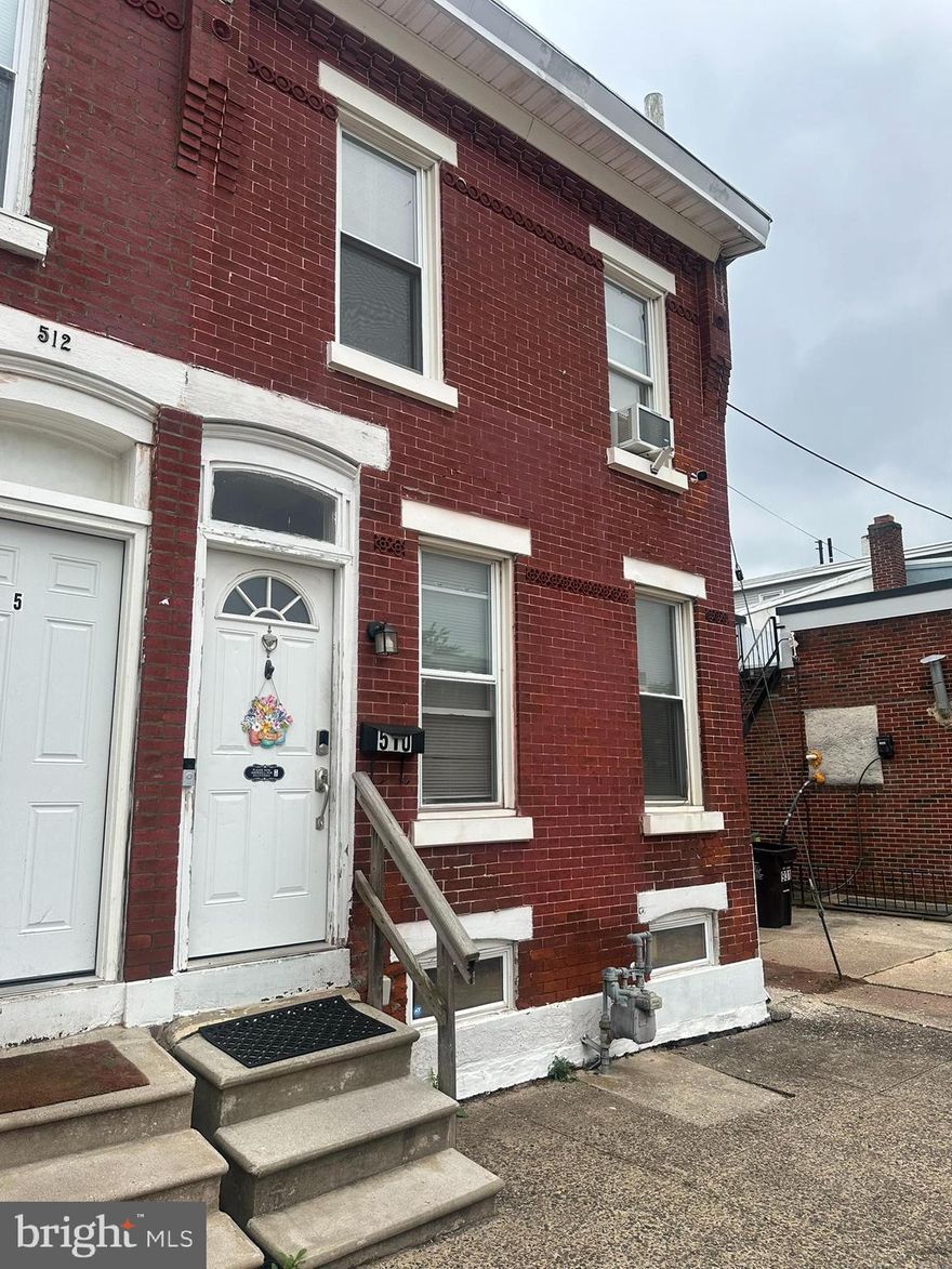 This is a Must See in Person!   Photos are from five years ago and do not capture the full charm and recent updates this home offers today.   Welcome to this brick end-of-row home in the West End of Norristown. Tastefully updated, with 2 designated parking spaces in the rear.  Enter to find an open floor plan with hardwood floors, high ceilings, and a nice archway that separates the living room from the dining room.  Being the end unit gives this home plenty of natural sunlight from the large windows.  You'll love the spacious L-shaped kitchen with tons of oak cabinetry for storage, and plenty of counter space for cooking.  NEW refrigerator, NEW dishwasher, and NEW garbage disposal! Out back is your own private oasis - a fully fenced backyard space, with a crushed stone patio.  A walkway leads you back to the designated parking spaces. Head upstairs to find 3 bedrooms with hardwood flooring throughout.  The main bedroom features double closets with custom built-ins for hanging clothes and drawer storage.  The sparkling bathroom was fully renovated to include new luxury vinyl plank floor (gray wood look), modern vanity, new bathtub, and new plumbing.  The hot water heater was replaced in 2023 and the roof was replaced in 2010.  All appliances convey with the home, including the new refrigerator, new dishwasher, washer/dryer, and the A/C window units.  With all the updating that's been done to this home, it would be perfect for a first time homebuyer to move right in, or a savvy investor looking for a turn-key property.  This is currently an income producing property; there is a long-term (5 year) tenant, with lease up for renewal in August. Either keep it as an income producing property, or use as a great starter home. Current owner has a home warranty in place, that will be transferred to the buyer for the remainder of the contract! Don't forget - there are 2 parking spaces in the back, what a convenient feature! Schedule a private tour to see everything this home has to offer.