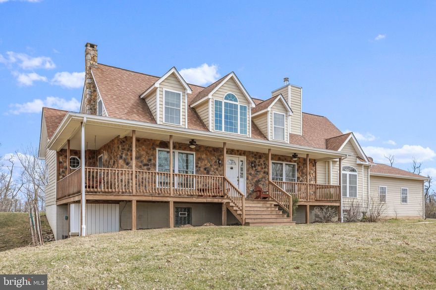 When only a premium property will suffice, 70.27 Acres of mountain top perfection offering commanding views in every direction. Truly an exclusive opportunity to acquire a very special property comprised of 20.33 Acres in one of Hampshire County’s most coveted locations, The Bluffs on The Potomac. The remaining 49.94 Acres along with the custom built home is pure West Virginia Unrestricted Gold! Immaculately designed, with over 2,200 square feet of living area, this elegant, yet rustic home in the hills has everything your heart could desire. 4 bedrooms, 3 full bathrooms, rec room, and a bright and open kitchen, living, and dining area that would be ideal for entertaining. The full, unfinished basement is ready for your imagination and the oversized 2 car garage is perfect storage for all the toys and tools required. Almost everywhere you turn there are astonishing views, allowing you to relax on one of the porches and soak in the natural world around you. A small pond and pavilion offer even more of an opportunity for adventure and spending time in nature. Ample outdoor storage and garden areas help maximize this true Mountaineer experience. The complete package offering views, hunting, outdoor adventure and private subdivision access to the South Branch of the Potomac River. Everything you could ever dream of is located less than 2 hours from Dulles Airport and allows you a quick escape to your very own safe haven in the mountains.