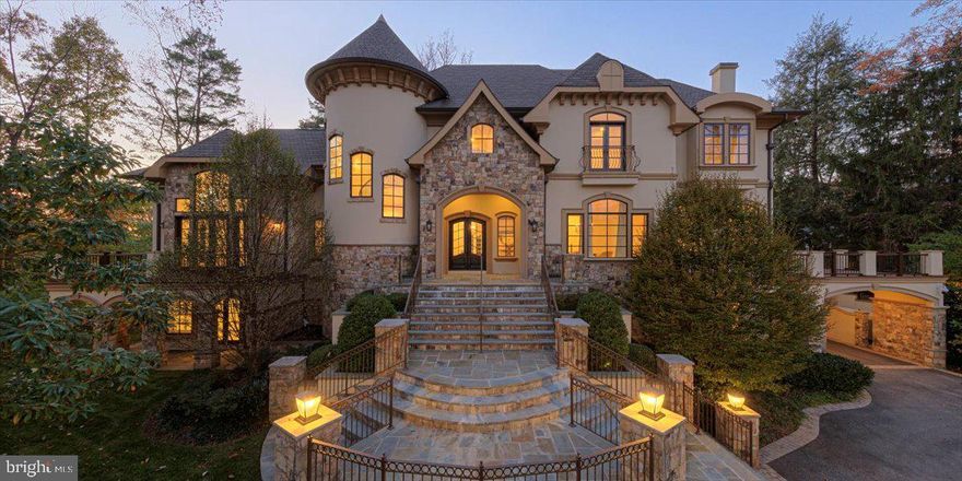 French Chateau masterpiece situated in the highly coveted Bradley Hills Grove of Bethesda. This estate boasts a thoughtful layout and a clean, contemporary interior (designed by the renowned Barbara Hawthorn), seamlessly blending glamour with functionality.

As you step inside, you'll be greeted by two-story ceilings followed by twelve-foot ceilings and unique ceiling architecture in almost every room, adorned with exotic Santos rosewood floors and inlay details. Elegant custom light fixtures and mounted accent lights gracefully highlight your fine art collection, while state-of-the-art lighting and automation add a touch of modern convenience to every corner of this exquisite home.

The main level features gracious proportions, generous windows and balconies off the library and living areas, offering expansive views of the meticulously landscaped outdoors. Windows throughout the house are adorned with shutters or motorized  designer window treatments, ensuring privacy and elegance.

For the culinary enthusiast, the main kitchen is equipped with a Sub-Zero refrigerator and double Wolf ovens with griddle and grill, while the adjacent catering kitchen boasts additional Sub-Zero refrigerator and commercial-grade equipment.

Entertain in style with a standout sunroom featuring an oversized party deck, and enjoy the technology package with speakers throughout the interior and advanced security for peace of mind.

The primary bedroom is a true oasis with a rotunda sitting room and a pass-through fireplace, leading to a balcony deck overlooking the lush grounds. This owner's retreat offers three closets, including a custom cabinetry showcase with glass-fronted doors, a stone island with drawers, and a full bathroom.

Additional highlights include an elevator, all secondary bedrooms with ensuite baths and extensive closets, and two separate staircases for added convenience.

The outdoor space is equally spectacular, featuring a pool, outdoor fireplace, manicured gardens, ample yard space for play, and a pool house complete with a full wet bar, an extra large bedroom, sitting area and a full bathroom.

The lowest level of the home boasts a gym, media room, a full bar area with a wine cellar, a SCIF room, and a walk-out covered wrap-around porch. With a four-car garage and porte cochere, this property exemplifies refined living.  Located near major highways, shopping areas and downtown Bethesda.