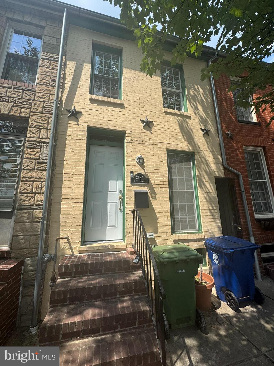 Discover 2124 Bank Street, a recently renovated rowhome nestled in Baltimore’s vibrant Riverside neighborhood (21231). This inviting rental features two bright bedrooms and two full & one-half baths, all illuminated by natural light through well-sized windows. Showcasing hardwood floors and an open-concept floor plan, the main living space flows seamlessly into a modern kitchen equipped with stainless steel appliances, granite countertops, and ample cabinet storage. For added convenience, enjoy in-unit laundry and central HVAC. Outside, an intimate private deck on 2nd level and rear 1st floor patio provides a peaceful retreat for morning coffee or evening meals. Just steps from scenic waterfront trails, park space, eclectic dining, and easy commuter access, this home perfectly balances city living with comfort and style.