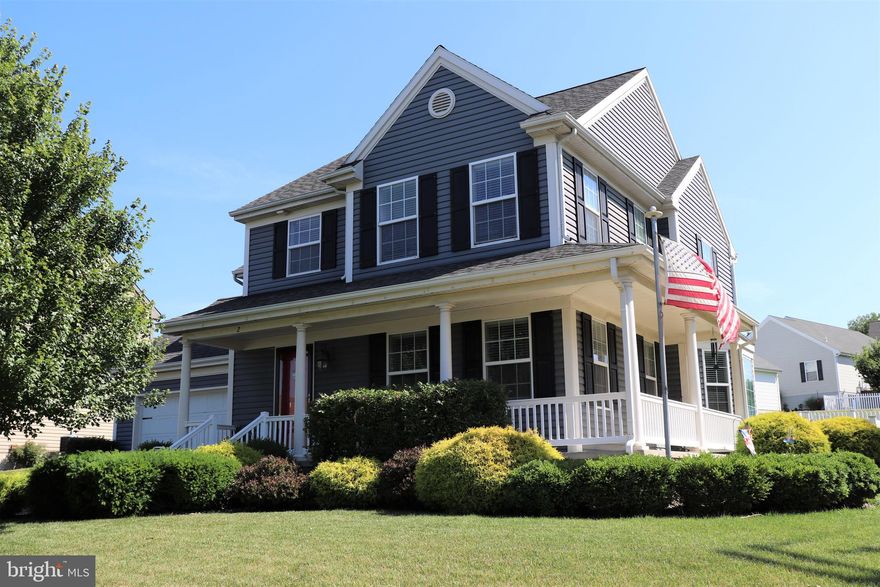 This eye-catching home perched on a corner lot with its charming wrap-around porch draws you right in the instant you enter the desirable community of Autumn Hills. Inside, you'll find a bright & spacious living room that flows right into the sun-soaked dining room with a bow window which is open to the lovely kitchen equipped with a handy breakfast bar, nearby pantry & all stainless appliances including a gas range. Retreat to the primary suite with a walk-in closet & a large double-bowl vanity with storage for linens. 3 additional bedrooms with ceiling fans & ample closet space & a full bath complete the 2nd floor. The finished basement provides a rec room space for gathering guests year round, a 5th bedroom & a full bathroom with a beautifully tiled shower with an upgraded shower head. Convenient 1st floor laundry closet, 2-car garage, gas heat & cool central air. The fenced backyard with a patio is ideal for small children or pets to play or just a short stroll across the street is a neighborhood park. A truly delightful home in a premium location!