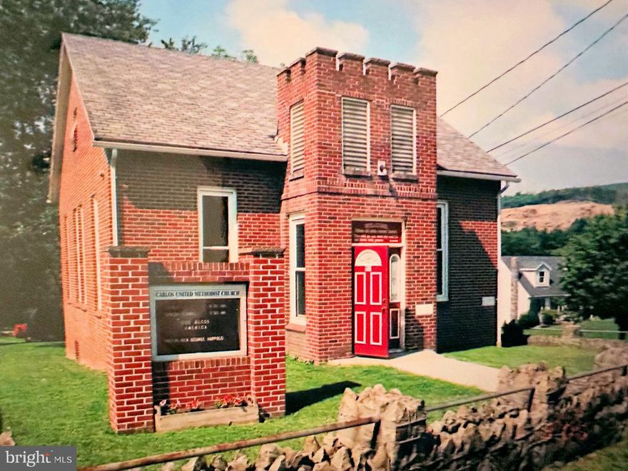 Located in a small, quiet community outside of Frostburg (the Village of Carlos), the former Carlos United Methodist Church is a small house of worship, built in 1895, and then reportedly rebuilt after a severe storm in 1914.  The building is two levels, and according to tax records, is 960 SF on each level.  The main level is a sanctuary with pew seating for approximately 75.

The lower level, which had previously been used for fellowship and Sunday school, suffers from water seepage.  The repairs needed to address the water penetration are unknown; but the situation could possibly be improved by the correct installation of downspouts.  Most of the chattels -- excluding the organ -- will convey with the sale.

There are several parking spots on the property, as well as street parking.  The property is served by city water and sewer, and heated by a fuel oil furnace.

To schedule a tour, please have your real estate professional book through ShowingTime.  There is no option to lease.  The seller has limited knowledge about the property and welcomes buyers to undertake a full inspection.  The property will be sold as is. Owner financing may be available for a full-price offer. Terms: 30% down, 7.5% interest, amortized over 20 years, 5-year balloon.  The seller makes no representation regarding condition, zoning, or use.  Buyers should address any issues during the study period.  The zoning is GU (general urban), which is residential with limited commercial and agricultural uses.  Please consult the county for any zoning and use questions.