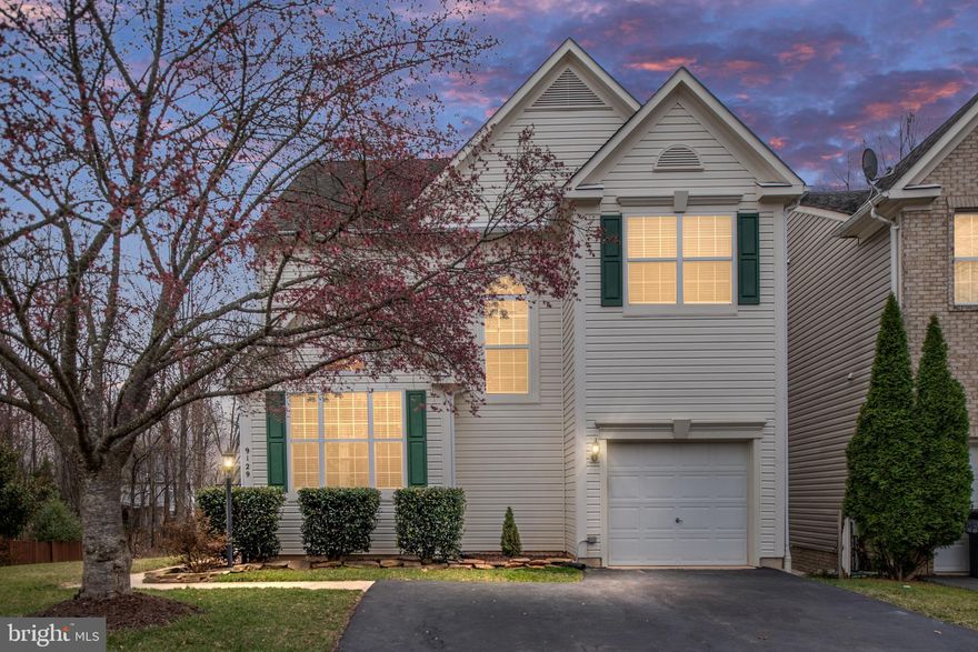 Welcome to your dream home! This stunning traditional-style residence, offers a perfect blend of comfort and modern living. Nestled in a serene cul-de-sac, this detached home, featuring three spacious bedrooms and three and a half bathrooms. The kitchen is a delight, equipped with modern appliances including a built-in microwave, dishwasher, and refrigerator, complemented by ample table space for casual dining. Enjoy the warmth of the fireplace, creating a cozy ambiance for those chilly evenings. The fully finished basement offers additional living space with a walkout entrance, ideal for a home office, playroom, or guest suite. With thoughtful features like ceiling fans, window treatments, and a combination of plush carpet and rich wood flooring, this home is designed for comfort and style. Outside, the property features a well-maintained front and fenced in rear yard, perfect for outdoor activities or relaxation. Newly installed composite decking perfect for family and friend gathering. The attached garage and driveway provide convenient parking options. Plus, enjoy community amenities such as basketball and tennis courts, and playgrounds just a stone's throw away. Don’t miss this opportunity to own a beautiful home that combines modern conveniences with a welcoming atmosphere. Schedule your tour today and envision your new lifestyle! House is close to the VRE, plenty of shopping and restaurants on Liberia. The neighborhood is close to Signal Hill park.