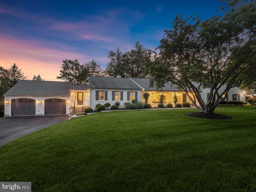 A rare offering in the coveted Stevenson community, this remarkable five-bedroom, three-and-a-half-bathroom designer home is the epitome of timeless luxury and sophisticated design. Set on an expansive and beautifully landscaped 0.79-acre lot, the home was masterfully curated by Feather Hill Interiors to create a harmonious blend of comfort, elegance, and functionality across two impressive levels. Step through the front door, where detailed crown molding, rich hardwood flooring, and flawless architectural finishes set the tone for what lies ahead. Sunlight streams through large windows, highlighting the craftsmanship and thoughtful design that define every room. To the left, a refined formal living room features an expansive bow window that frames the front lawn like a living portrait. The elegant dining room, adorned with custom built-ins, is designed to host intimate dinners or grand-scale celebrations. Just beyond, the family room invites you to relax and unwind, offering the warmth of a wood-burning fireplace, ample gathering space, and serene backyard views. Prepare your favorite meals in a kitchen that is a culinary dream, with quartz countertops, a glass subway tile backsplash, and a dramatic nine-foot island with stylish pendant lighting anchoring the space. A full suite of stainless steel appliances pairs seamlessly with soft-close 42” cabinetry, while a wine and beverage center provides effortless hospitality. The adjoining breakfast nook is perfect for casual meals, morning coffee, or weekend brunches. Tucked away at the end of the main level, the primary bedroom suite is a true retreat. The spa-like en suite bathroom offers a sense of calm with its clawfoot soaking tub, spacious walk-in shower, marble tile and vanity, and charming shiplap accents. A generous walk-in closet, thoughtfully outfitted with custom storage, completes the suite. Three additional main-level bedrooms provide comfort and style, sharing a beautifully finished full bathroom with a dual-sink vanity and a designer-tiled shower-tub combination. A chic powder room adds convenience for guests. Just off the hallway, a well-appointed mudroom offers built-in cubbies, an oversized laundry room, and direct access to the breezeway addition, completed in 2019. Designed with everyday ease in mind, this thoughtful transition connects to the attached two-car garage, creating a stylish and convenient new side entrance. The fully finished lower level opens to a sprawling rec room, providing ample space for game nights, movie screenings, or quiet mornings in the cozy reading nook. Also on this level is a private fifth-bedroom suite with its own full bath—ideal for overnight guests. Step outside to experience the privacy of the backyard. A newly added, thoughtfully designed patio blends functionality and sophistication with a vaulted wood-paneled ceiling, recessed lighting, and a ceiling fan offering a shaded retreat for dining or lounging in comfort. Gather around the custom firepit for evening conversations beneath the stars, surrounded by mature trees and lush landscaping that ensure both beauty and privacy. This exceptional home, with its effortless elegance and thoughtful design, is more than just a place to live.