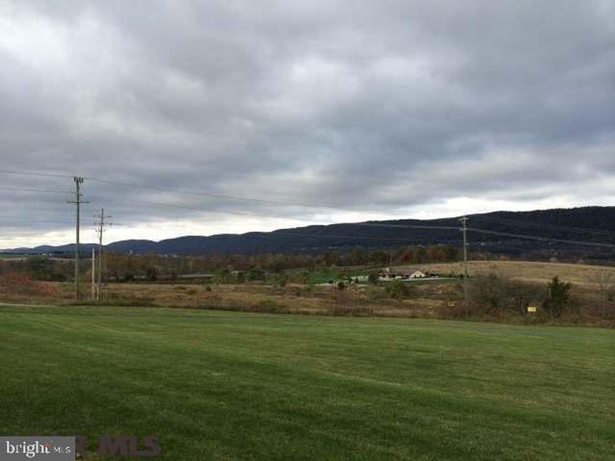 Build your own dream home today! Only 5 homesites left in this Established Bellefonte area neighborhood. Settled in the sprawling hills between State College and Bellefonte and next to the I-99 interchange, these homesites feature some amazing views, wooded lots as well as a quiet country setting. The community features natural gas, sidewalks, walking paths, and a park. The preferred builder is Loesch Construction, but you are allowed to go with any builder of your choice. If you want an amazing value and options for walk out lots, call today and get them before they are gone! Currently Lots 38, 39, 42, 45, & 46 are available priced at $45,000. As an added benefit to the buyer, both of the listing agents have experience with new construction and one is related to the builder/owner. Contact the listing agents today for more details.