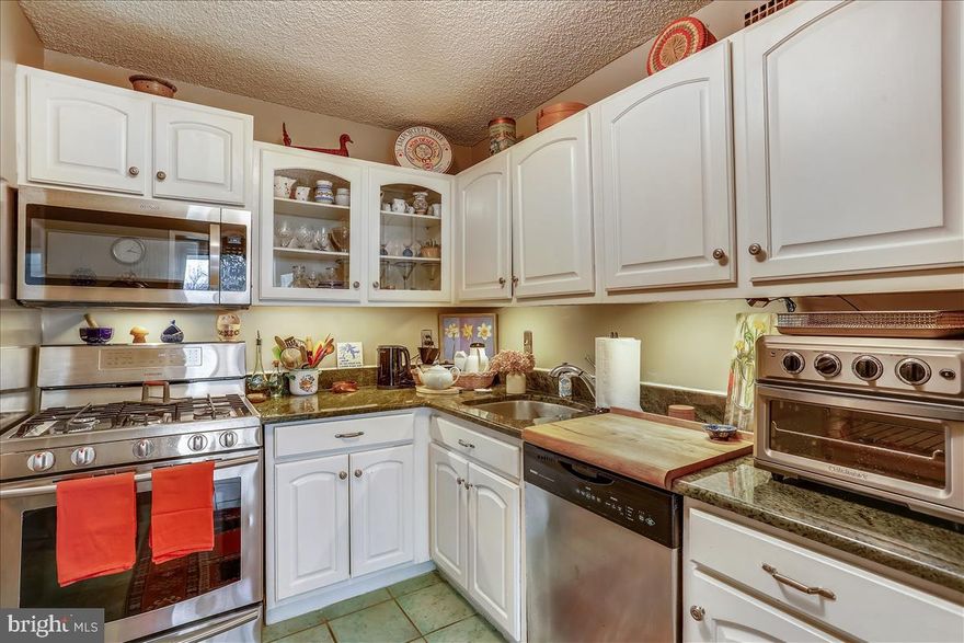 The pictures are worth a thousand words.  Beautiful apartment, beautifully maintained. 981 sq ft, two bedrooms or one bedroom and den/ one bath.  Completely and tastefully updated bath and kitchen as well as beautiful new hardwood floor. Assigned garage space.   Resort-type amenities: on new arcade level: Chef Tony's Seafood Restaurant of Bethesda; superb  gym (with recirculating air) and PIlates Studio; indoor pool; whirlpool; saunas.  Olympic-sized outdoor pool. Seven lighted tennis courts with league play and clubhouse. New gas grills, ten EV stations (!!!), firepit on observation deck, market with deli counter  and wine selection. 24-hr front desk clerk. 24-hour security.  Guest suites. Ride-on bus to Metro. Lots of guest parking. Very near #270 ,#495, NIH and Walter Reed.