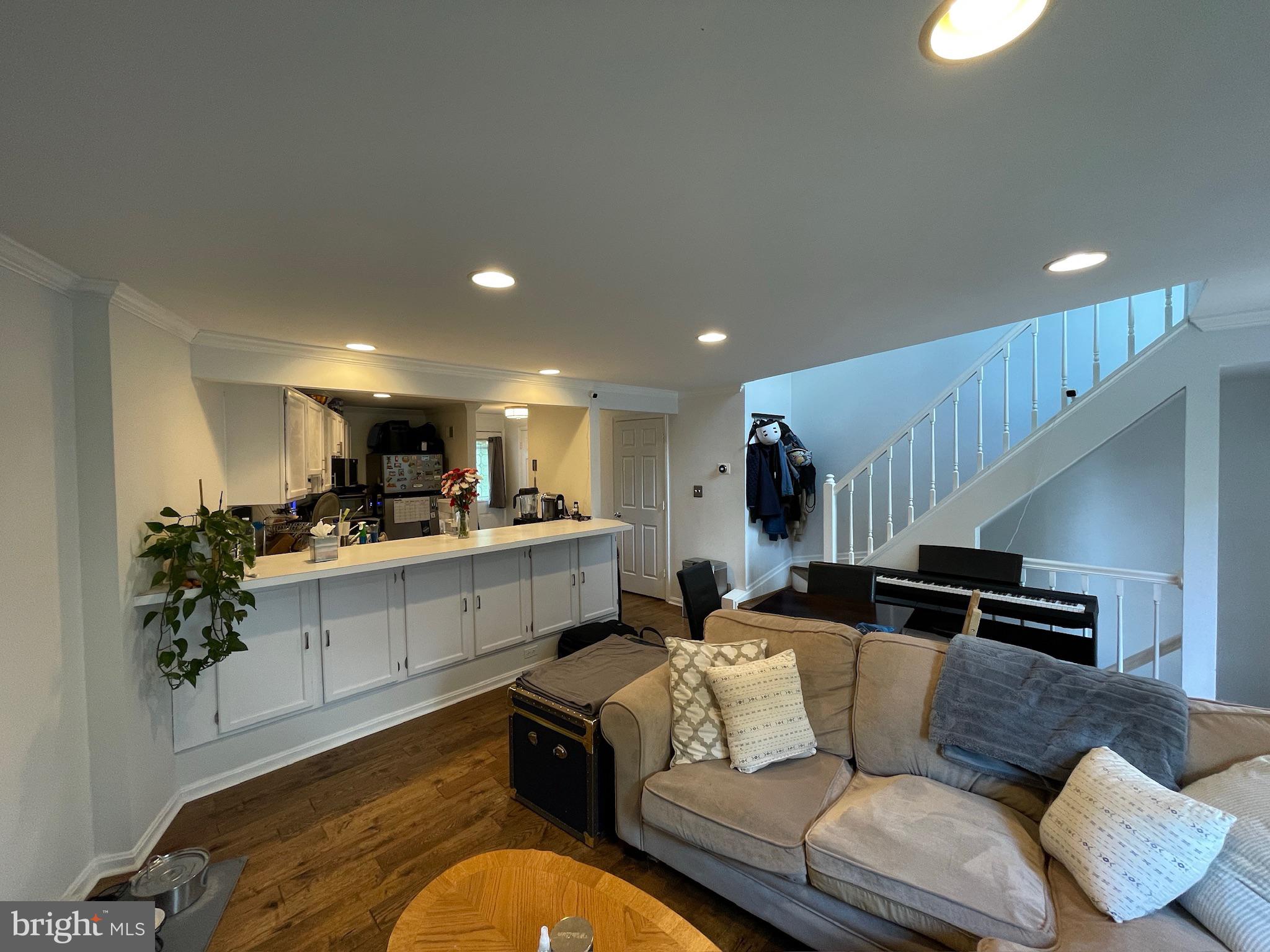 Amazing Townhouse in the heart of the desirable Kingstowne community. This beautiful 2BD/3BA home has an updated kitchen with granite countertops and an oversized, eat-in breakfast bar. The open concept with beautiful wood floors on the main floor is an excellent use of space, and it walks out to a spacious deck with great privacy because the house backs to the woods. The primary suite upstairs is a light-filled loft with a privacy door and a continuation of the incredible wood floors from the main floor. It also provides a large walk-in closet and has an en-suite bathroom with a double vanity, stand-up shower, and large soaking tub. The basement is an excellent living/relaxing/entertaining space has well. It has a spacious main area that opens to a beautiful paver patio and a small fenced-in backyard. It also contains a full bath with a standup shower, and a laundry room with included washer and dryer. The community amenities are 100% included. There are 2 pools, 2 tennis courts, 2 gyms, and 4 running trails to fulfill your indoor and outdoor recreational needs. Last but not least, it's less than 10 minutes to Fort Belvoir, the Franconia-Springfield Metro stop, Springfield mall, Wegmans, Kingstowne Town Center, and tons of restaurants, retail stores, and grocery stores.