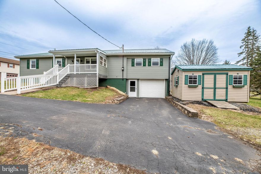 Location, Location, Location! This low-maintenance, waterfront ranch in the highly sought-after Howard Borough offers a truly rare opportunity with direct access to Bald Eagle State Park and Sayers Lake, affectionately and locally known as the Howard Dam. Whether you're seeking a full-time residence, a vacation lake house, or a potential Airbnb, this property provides endless possibilities!

Step inside to discover a spacious home featuring 3 bedrooms, an open-concept kitchen/dining area, and a large living room perfect for relaxation and entertaining. The possibilities in the huge sunroom are truly exciting — imagine large windows and glass doors all around, offering stunning panoramic views of the serene lake. This is the ideal space to soak in nature, entertain guests, or simply unwind.

The high basement ceilings present the perfect opportunity to finish the space and create your dream den or entertainment room. Walk outside and experience the expansive backyard that effortlessly transitions into acres of grassy land, offering the perfect setting for hiking, outdoor activities, hosting events, and more!

For water enthusiasts, the property provides direct access to the lake, where you can enjoy kayaking, boating, fishing, and swimming right at your doorstep. With the lake gently splashing against the property, this is a true waterfront paradise.

Don't miss out on this rare and exceptional piece of real estate — bring your vision and transform this blank slate into your dream waterfront home!