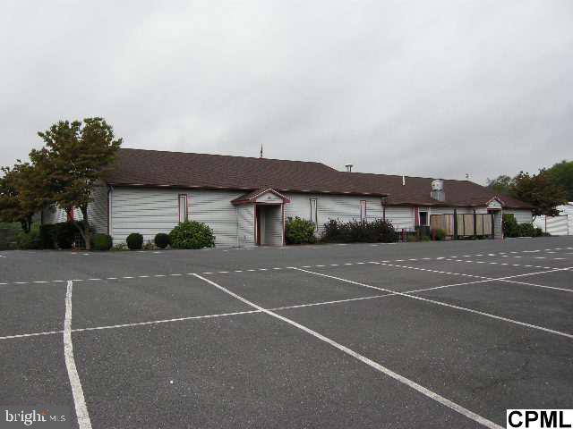 This property is the Perry County Grange Hall, the building has a full kitchen and large banquet room, small conference room, restrooms and office space. The property includes 4.998 acres and a large blacktop parking lot. The entire property in in excellent shape.