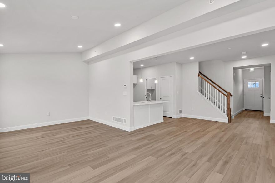 END UNIT - QUICK DELIVERY  LOT 24! The heart of the home features a stunning, upgraded kitchen, with white cabinets, quartz countertops, and a center island — perfectly connected to the dining and living spaces for easy entertaining or cozy nights in.  The open living spaces is a wide open, soaring great room with vaulted ceilings that instantly feels bright, airy, and welcoming.  Rear sliders lead to composite decks or concrete patios, depending on grade.  Upstairs, the spacious primary suite is your private retreat, complete with a primary bath with double bowl vanity and a walk-in closet big enough to impress. Two additional bedrooms, a full bath, and an oversized linen closet offer space for everyone.  These townhomes are designed with three professionally designed color palettes — so whether your style is bold, warm, or cool and modern, there’s an Addison that fits your vibe. Plus, this is truly low-maintenance living — the HOA takes care of lawn care and snow removal. Pair that with an oversized one-car garage and a location in charming Fleetwood, and you’ve got the ultimate in carefree, luxury townhome living.  One more thing...backed by the one year Builder Warranty, we've got you covered!