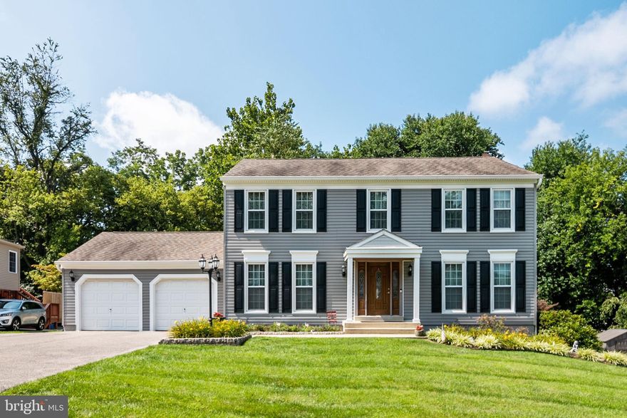 Warm and, Welcoming , and beautifully maintained  4 bed/2.5 bath , sun filled single family home located in sought after Crest Manor Estates.  The upgraded  kitchen features stainless steel appliances, white cabinets, and gorgeous countertops. Open to the kitchen is a cozy family room with access to the deck and yard. Beautiful hardwood floors throughout the main level.  Completely finished basement  with plenty of room for entertaining or storage. Walk out and enjoy the well kept backyard on either the private deck, or the upgraded patio.  Gorgeous landscape and an additional storage shed. This gorgeous property is move in ready!   Check out the virtual tour and 3D model!  Close to major commuter routes and great school district!