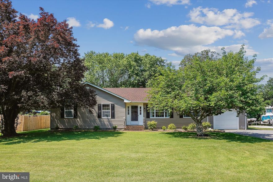 Beautifully updated 4-bedroom, 2.5-bath waterfront home on nearly an acre along scenic Hurst Creek—just off the Choptank River! This 2,496 sq ft retreat offers its own private dock plus access to a community boat ramp and dock. Inside, enjoy an updated kitchen with granite countertops, stainless steel appliances, and stylish finishes. The home also features renovated baths, a cozy wood-burning fireplace, a bright sunroom, and new siding. Step outside to a spacious deck perfect for entertaining or soaking in peaceful water views. Additional perks include a 1-car garage, flexible living space, and a .93-acre lot with plenty of privacy. Located less than an hour to the beach and just 90 miles from D.C., this move-in ready home delivers the best of Eastern Shore living—whether full-time or as a weekend escape!