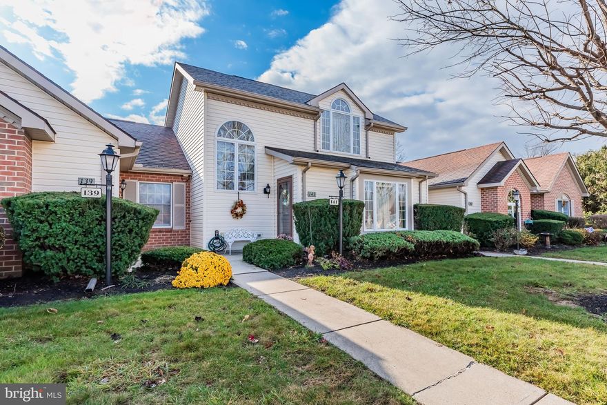 NEW PRICE! If you are looking for a home  that combines functionality, comfort and style, look no further! Welcome to maintenance free living in Forest Meadows.  With over 1,400 square feet of living space you will not lack storage space or feel confined.  The main level features all you will need for comfort - - - living room, dining room, den/ tv room, primary bedroom and full bath with laundry.  Comfortable and efficient kitchen is open to the dining area so you will never miss out on the conversation while entertaining!  Upstairs you will discover a loft bedroom with vaulted ceiling, 2nd full bath and closet perfect for when the out of town kids come to visit OR turn this in to a second living room or tv room! Outside you will find a private patio leading to the oversized 2 car garage with plenty of storage - - no more up and down basement steps! Lovely community with sidewalks to stroll and close to medical facilities, grocery, banking and eateries!