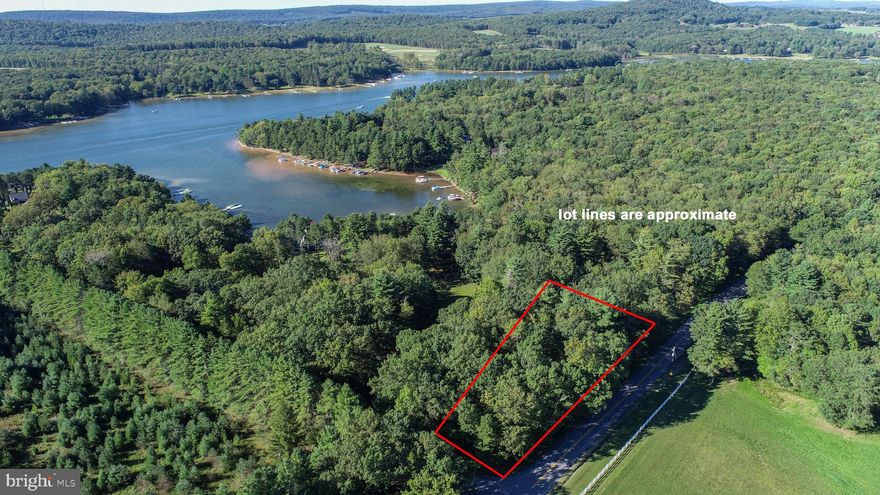 Get ready to build your vacation retreat or full-time residence on this 1.19 AC lot, conveniently located at the corner of Green Glade and Hazelhurst Rd. Nicely wooded, with a level area perfect for your homesite, and then it meanders with a slight slope toward the lake.  There is no HOA at this location so no mandated building specs.  The tax record states that this property has 192' of LF but this site will not qualify for a dock permit. Bring your building plans and establish roots in Garrett County, with your new home at the southern end of beautiful Deep Creek Lake!.