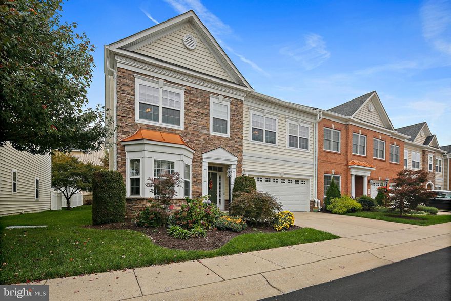 Looking for luxury and maximum square footage in a 55+ adult active senior community?  Look no further!  This villa, in the sought-after community of Snowden Overlook, is the largest home in the community.  The formal front entrance, with top and sidelights around the door, bid you and your guest's welcome.  Gleaming hardwood floors are showcased in the entryway, dining area, living area, sunroom, powder room, and kitchen.  Stately columns add sophistication to both the foyer and the kitchen.  Featuring an open floor plan, this home has soaring vaulted ceilings with second story windows for additional light - a rare and unique feature in this community. This home is perfect for entertaining, as conversation flows easily from the kitchen to the living and dining spaces.  The kitchen, larger than most in this community, features custom maple cabinets, beautiful granite countertops, a custom ceramic tile backsplash, recessed lighting, and a generous pantry. Additionally, there is ample counter and cabinet space.  Stainless steel appliances, a gas cooktop with range hood, and a built-in oven and microwave complete this space.   Located at one end of the kitchen you will find a convenient main-level washer and dryer.  Continue through this area for access to the 2-car garage. A separate eat-in nook with a slider leads out to the custom slate patio, ideal for al fresco dining.  
The living room is spacious with a cozy dual-sided fireplace adorned with a mantel.  On the other side of this fireplace, also featuring a mantle, soak up the sun in the bright and airy sunroom.  Elegant crown moulding graces the dining area and the powder room. The main-level owner's suite is generously sized and features vaulted ceilings and a large walk-in closet with custom built-ins. The owner’s bathroom provides a double-bowl vanity with granite countertops, and an oversized stand-up shower with ceramic tile.  An office is located at the front of the home and features a large bay window.    
The upper level provides perfect guest accommodations with 2 large bedrooms, each with their own ensuite full bath including a five-piece owner’s bathroom.  Both bedrooms also offer large closets and lots of windows for natural light.  A loft area is ideal for a secondary sitting area or additional office space and the upper-level loft opens to the family room and foyer below.  A large walk-in storage closet with custom built-ins completes the upper level. The basement level is ready for your personal touches and is massive!  It has the potential to provide an additional 1712 sq ft of space when completed to your personal design. Furthermore, the home has been impeccably maintained and features several upgrades, such as a brand new Trane HVAC (2023), GE Profile dishwasher (2020), and top of the line Casablanca ceiling fans. The gated community of Snowden Overlook has so much to offer, including Community Resources, Club House, Fitness Center, Library., Pool, and Theater!  See everything at Snowden Overlook | An Active Adult Community.  With two full time staff members, including a social events coordinator, there are always social events you can participate in if desired.  This location has it all!  Nearby find amazing restaurants and stores for everything imaginable including groceries, sporting goods, home goods, clothing, crafts, and so much more!   Wegmans is 1.5 miles away, and Costco and Trader Joe's are 2 miles.  This area offers unlimited opportunities for dining, shopping, and activities.  Located in convenient Columbia, MD gives access to parks, trails and recreation, and a short drive leads to great cultural and historic sites in Baltimore and Washington, DC. Commuter routes include MD-175, MD-32, Rt.29 and I-95.  Come and make lasting friendships and memories in this wonderful home and community!  **Please view 360 Photo Tour**