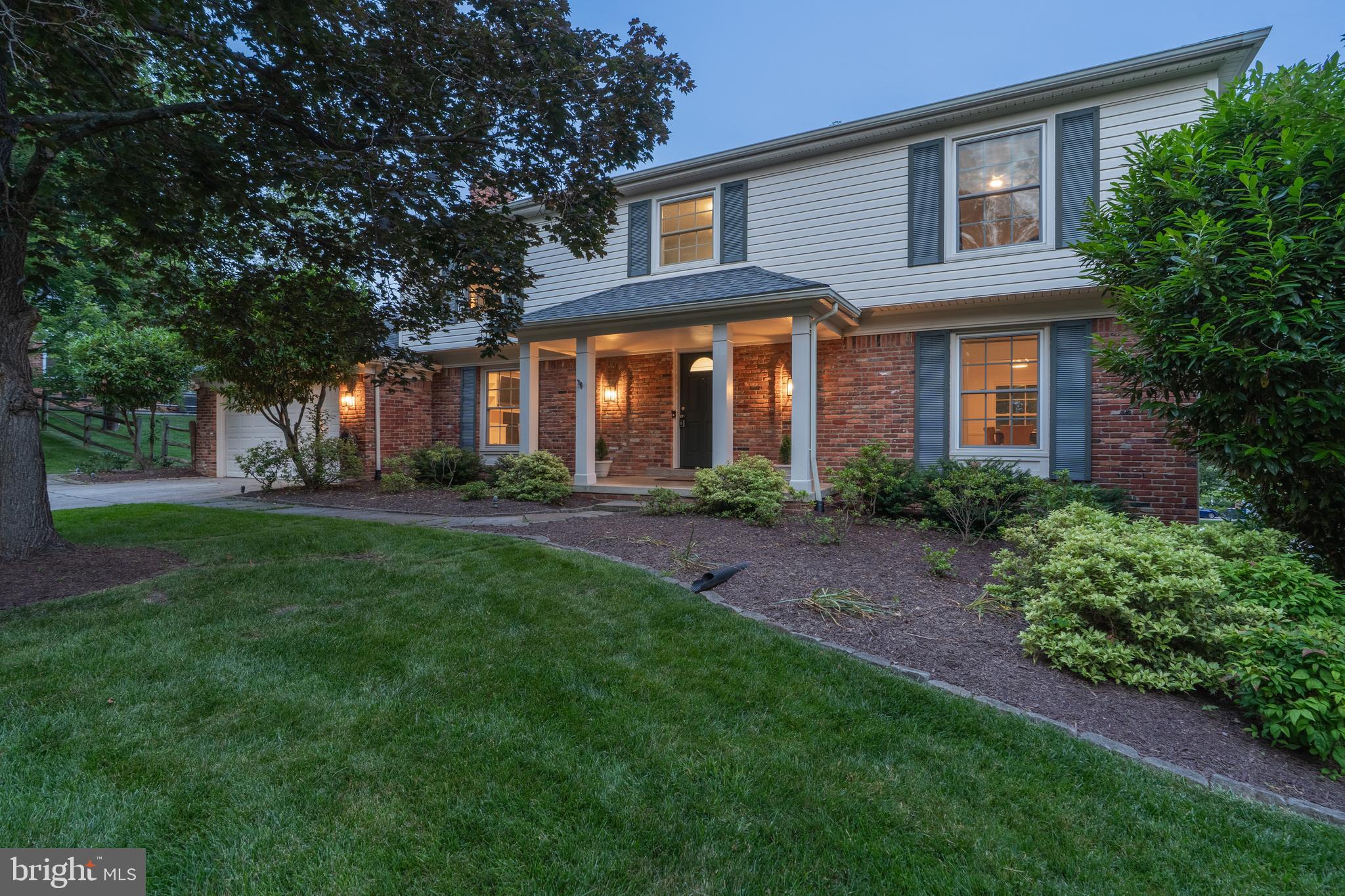 Located on a beautifully landscaped corner lot in the sought-after Fox Hills neighborhood, this well-maintained colonial blends classic charm with modern comfort. Mature trees, lush greenery, and a full irrigation system enhance the home’s inviting curb appeal.
Inside, you'll find a welcoming family room filled with natural light. It features custom built-in shelves, soft recessed lighting, and a cozy gas fireplace, all framed by stylish woodwork. French doors open up to a large Trex deck, offering a great setup for both indoor and outdoor living and entertaining.
The sunlit eat-in kitchen features crisp white cabinetry, a picture window overlooking the deck, a pantry for added storage, and a seamless connection to the formal dining room. Just off the tiled foyer, hardwood floors lead to the formal living room. Crown molding and other thoughtful upgrades add sophistication throughout. A convenient mudroom/laundry room off the two-car garage offers abundant storage and functionality for daily living.
Upstairs, you'll find four comfortable bedrooms, including a generous primary suite with a large walk-in closet, an ensuite bath, and a well-appointed hall bath serving the remaining rooms. The walk-out lower level, fully-finished, adds exceptional versatility with a large rec room or second family room, a bonus room perfect for a home office, another full bath, and a kitchenette for added convenience.
Additional features include a whole-house generator for peace of mind year-round.
Ideally located just minutes from Cabin John Village, with shopping, dining, and grocery options, and close to Cabin John Regional Park, featuring trails, playgrounds, an ice rink, and sports fields. Easy access to major commuter routes and zoned for Bells Mill ES, Cabin John MS, and Winston Churchill HS—this home offers comfort, flexibility, and a fantastic location in one of Potomac’s most desirable neighborhoods.