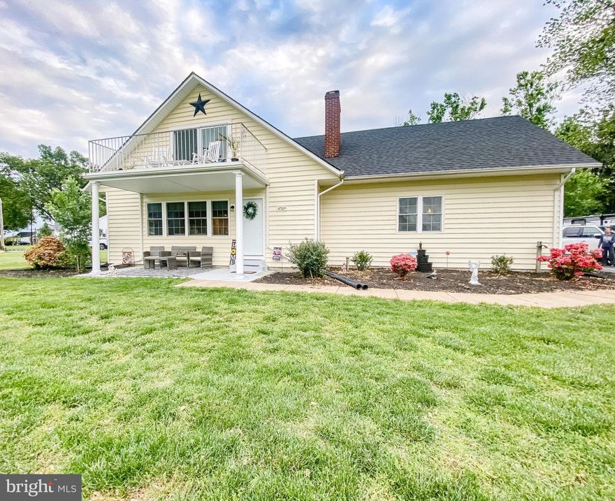 Wow, you are not going to want to miss seeing this property! Situated on one of the larger lots in the community, this beautifully updated & remodeled home features  6 bedrooms, 4 full bathrooms and water views galore! Updated paint, flooring & carpet throughout the home. The upstairs balcony has a new sliding glass door & new screen for those days you want to take in the fresh air. The renovation of the  new modern stairway leading to the upstairs really allows for the open concept to flow through the entire main floor. For those days you want to relax, step outside & enjoy the  hot tub while taking in the gorgeous landscape.