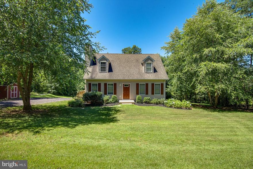 Look no further!! Move right into this charming cape cod located on 1 acre. Nice open kitchen.  Main level master bedroom with hardwood floors in all of the bedrooms, living room and kitchen.  Large deck to enjoy your evenings and host cookouts.  You will not be disappointed! All you need to do is move in!