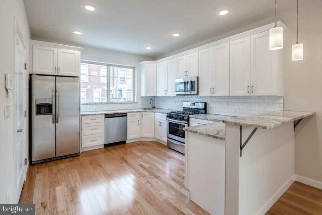 Photo of 1712 S 19th Street #UNIT A, PHILADELPHIA, PA 19145 (MLS # PAPH2579024)