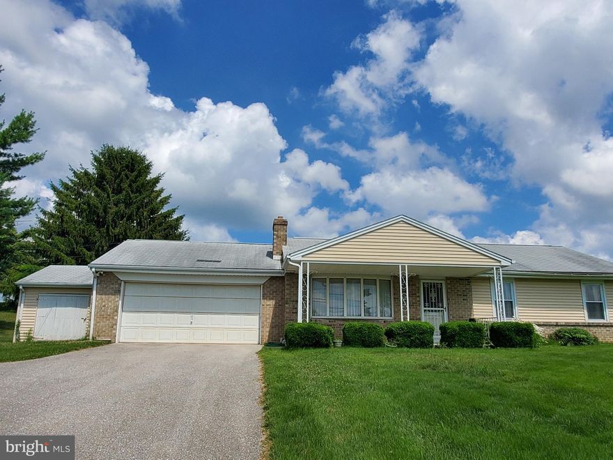 This all-brick ranch has 4 bedrooms and 2 full bathrooms on the main level. The living room features a wood burning fireplace and wonderful views out the picture window. Off of the dining area is a nice covered rear patio. The basement could be made into a huge rec room. Plenty of driveway parking - an oversized two car garage - and a large shed. The windows and a/c are newer - house just needs some cosmetic updates inside. Nothing but fields behind this house. Seller is putting a new roof on the house and upgrading the electric with a new 200-amp panel.