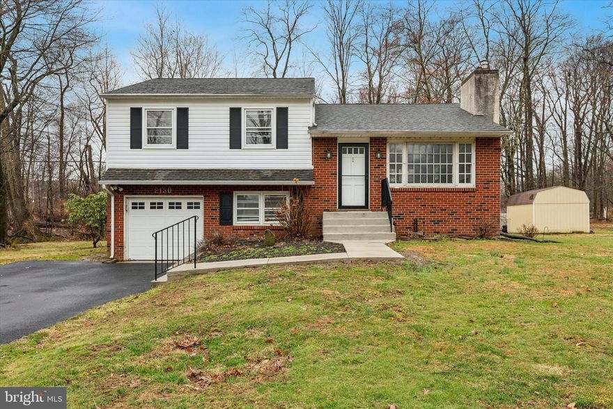 Welcome to 2130 Herblew Road, tucked away on a quiet cul-de-sac and set on a beautiful, oversized wooded lot at the end of a peaceful neighborhood street. Step inside to the newly updated great room, where soaring vaulted ceilings and abundant natural light highlight the original exposed hardwood floors, creating a bright and inviting living space. The open-concept kitchen is thoughtfully designed for both everyday living and entertaining, featuring chef-grade appliances and stylish finishes, all seamlessly connected to the main living area. Just a few steps up, you’ll find three well-sized bedrooms and a full hall bath. The primary suite includes its own private half bath and overlooks the expansive backyard, offering a quiet retreat. The lower level provides exceptional versatility, with direct access to the oversized garage, a convenient half bath, and a spacious flex area ideal for a home office, gym, or playroom. A fully carpeted den creates the perfect spot to unwind and enjoy your favorite shows. Downstairs, the unfinished basement offers incredible potential—currently used for storage, this space is ready to be transformed to fit your vision. Ideally located within walking distance to top-rated Central Bucks Schools, and just minutes from shopping, dining, and major roadways, this home truly has it all. Don’t miss your opportunity to make it yours.