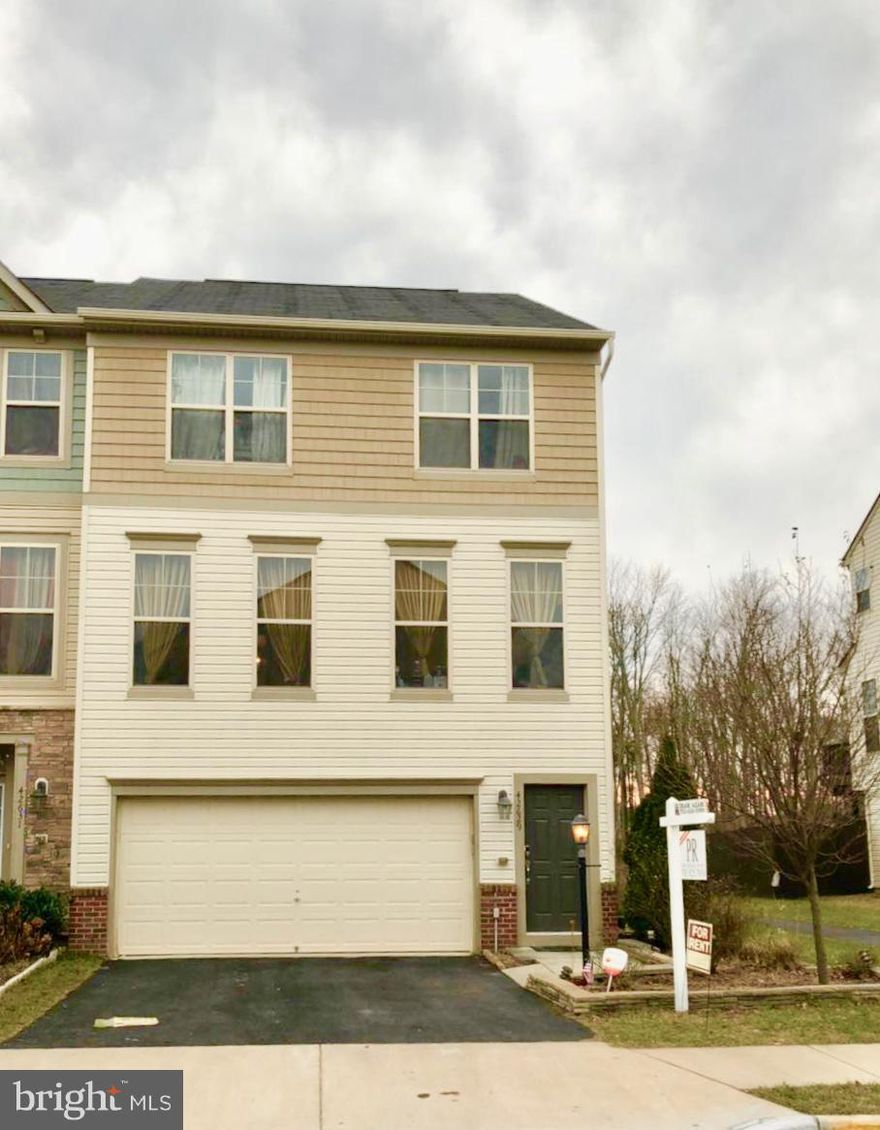 Spacious 2 Car Garage End Unit Townhouse in Broadlands. Backs to trees and basketball court. All three levels have 8 ft extension. Open floor plan, Gourmet Kitchen with Island. Upgraded Master Bath. Lower level has speakers with Home Theater setup.