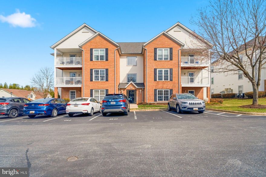 Affordable independent living in Sykesville! You'll love this top-level 55+ unit in Winifred Manor where the vaulted ceilings help to make it feel super open and airy. No neighbors above, just below. Lots of natural light beams through, and the primary BR has a walk-in closet and full bath w tub and shower. This unit has two full baths - the second has a stand-up shower for easier access. Recent updates over the past 4 years:  water heater, carpets, lights and ceiling fans, newer toilet, bathroom faucets, and new windows and slider. HVAC is 2018.  The stove, fridge, and washer dryer are about 4 years old. Assigned parking (#62) is just outside the front door with ample unassigned spaces for visitors. Mailboxes are close, and there is an elevator in this 3-floor building. This third floor rear unit offers extra privacy and a view of the common areas. Relax on the new (2024) composite deck balcony, or head to the community hall for card games and other activities. Winifred Manor allows pets (with some restrictions), and is a meticulously maintained, smoke-free community that handles the hard work for you. Your monthly condo fee includes water, landscaping, snow removal, and trash. Enjoy peace of mind with a secure double-key entry, assigned parking right at the front door, and a safe one-way entrance/exit. Everything you need is right in town! Sykesville/Eldersburg has plenty of shopping, dining and other amenities. Make your appointment to tour this property!