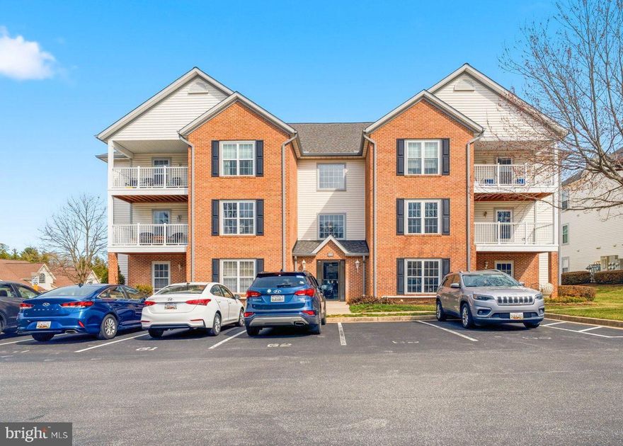 Affordable independent living in Sykesville! You'll love this top-level 55+ unit in Winifred Manor where the vaulted ceilings help to make it feel super open and airy. No neighbors above, just below. Lots of natural light beams through, and the primary BR has a walk-in closet and full bath w tub and shower. This unit has two full baths - the second has a stand-up shower for easier access. Recent updates over the past 4 years:  water heater, carpets, lights and ceiling fans, newer toilet, bathroom faucets, and new windows and slider. HVAC is 2018.  The stove, fridge, and washer dryer are about 4 years old. Assigned parking (#62) is just outside the front door with ample unassigned spaces for visitors. Mailboxes are close, and there is an elevator in this 3-floor building. This third floor rear unit offers extra privacy and a view of the common areas. Relax on the new (2024) composite deck balcony, or head to the community hall for card games and other activities. Winifred Manor allows pets (with some restrictions), and is a meticulously maintained, smoke-free community that handles the hard work for you. Your monthly condo fee includes water, landscaping, snow removal, and trash. Enjoy peace of mind with a secure double-key entry, assigned parking right at the front door, and a safe one-way entrance/exit. Everything you need is right in town! Sykesville/Eldersburg has plenty of shopping, dining and other amenities. Make your appointment to tour this property!