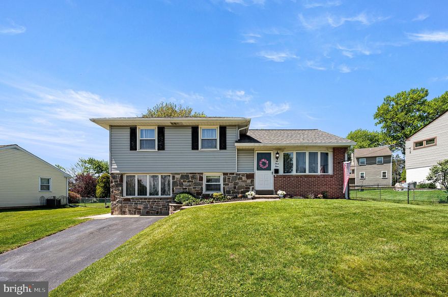Welcome home to this beautifully maintained 3-bedroom, 2-full bath split-level residence, perfectly situated on a level, fenced-in lot in a highly sought-after community. Designed with a functional layout that maximizes both privacy and shared living space, this home offers three distinct levels of comfort. Upon entry, the open and inviting floor plan includes a bright living room, a comfortable dining room that opens to the back yard and a functional kitchen, making it an ideal setup for hosting and daily life. 
The upper level features three spacious bedrooms and a full hallway bathroom, providing a quiet retreat away from the main living areas. The lower level boasts of the converted garage area which now serves as an additional bedroom  but can be used as a generous family room, offering the perfect spot for movie nights, a home office or an area for exercise. This level also includes a second full bath, a dedicated laundry area and exit to both the driveway and the rear yard for ultimate convenience. Step outside to a large, level backyard—fully fenced and ready for gardening, pets, or play. Located in a desirable neighborhood known for its curb appeal and community feel, this home combines suburban tranquility with easy access to local amenities. Lower level rooms/bathroom remodel 2016, new roof 2019,  new water heater and HVAC 2020.
Agent is related to sellers.