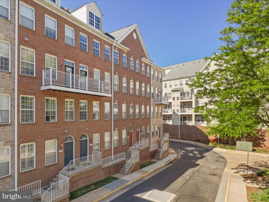 2 bedroom, 2.5 bath two level condo town home with garage parking spot. Open kitchen to living area with gas fireplace and two balcony's: one off 2nd bedroom and the other off living area with Fireplace. 2nd living room off main entrance offering lots of open space. close to Metro, future Harris Teeter, Gallows Rd. and Lee Highway.