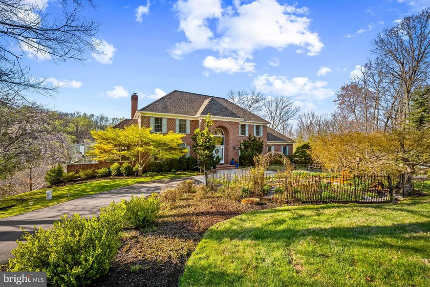 Built with love, maintained with care!   After 33 years of creating happy memories and clear pride of ownership, these Sellers are ready to entrust their custom-built home to the next lucky owners.   Located in desirable Ivy Hill, this brick and cedar siding home offers a peaceful setting, mature gardens and serene panoramic views.   The marble-floored entry with split staircase welcomes you to a floor plan equally suitable for grand entertaining or comfortable family living and opens to the dining room large enough to easily seat a dozen family or friends and the elegant living room, both of which also feature marble flooring.  The eat-in kitchen with ceiling height cherry cabinetry and granite counter-tops is adjacent to a large family room with access to a new composite deck overlooking nearly 2 acres of private land.  A combination of majestic trees and sweeping lawn, the lot boasts a large, cleared space suitable for a pool and the soothing sounds of the creek running below.  A laundry room, private den/office, year-round greenhouse and powderroom, along with access to the epoxy-floored 3 car garage, round out the entry level.   The second floor features 4 large bedrooms, all with Brazilian cherry floors, and 2 full bathrooms, including a primary suite with an over-sized walk-in closet.  What is surrenlty an office/sewing rooms backs to the primary bathroom making fr an easy conversion to en suite bath to BR 2.  Buyers looking for rarely-found, true multi-generational living are in luck!  The lower levels offers the ultimate opportunity with 3 bedrooms, 2 full bathrooms, a second kitchen and laundry room along with dining and living areas which open to the backyard - a home within a home.   Located within 10 minutes of Hunt Valley shops and restuarants and zoned public schools (Mays Chapel ES, Cockeysville MS & Dulaney Valley HS), 15 minutes of local hospitals and 25 minutes of downtown Baltimore, 13040 Jerome Jay Drive provides an unparalleded combination of convenience and privacy.